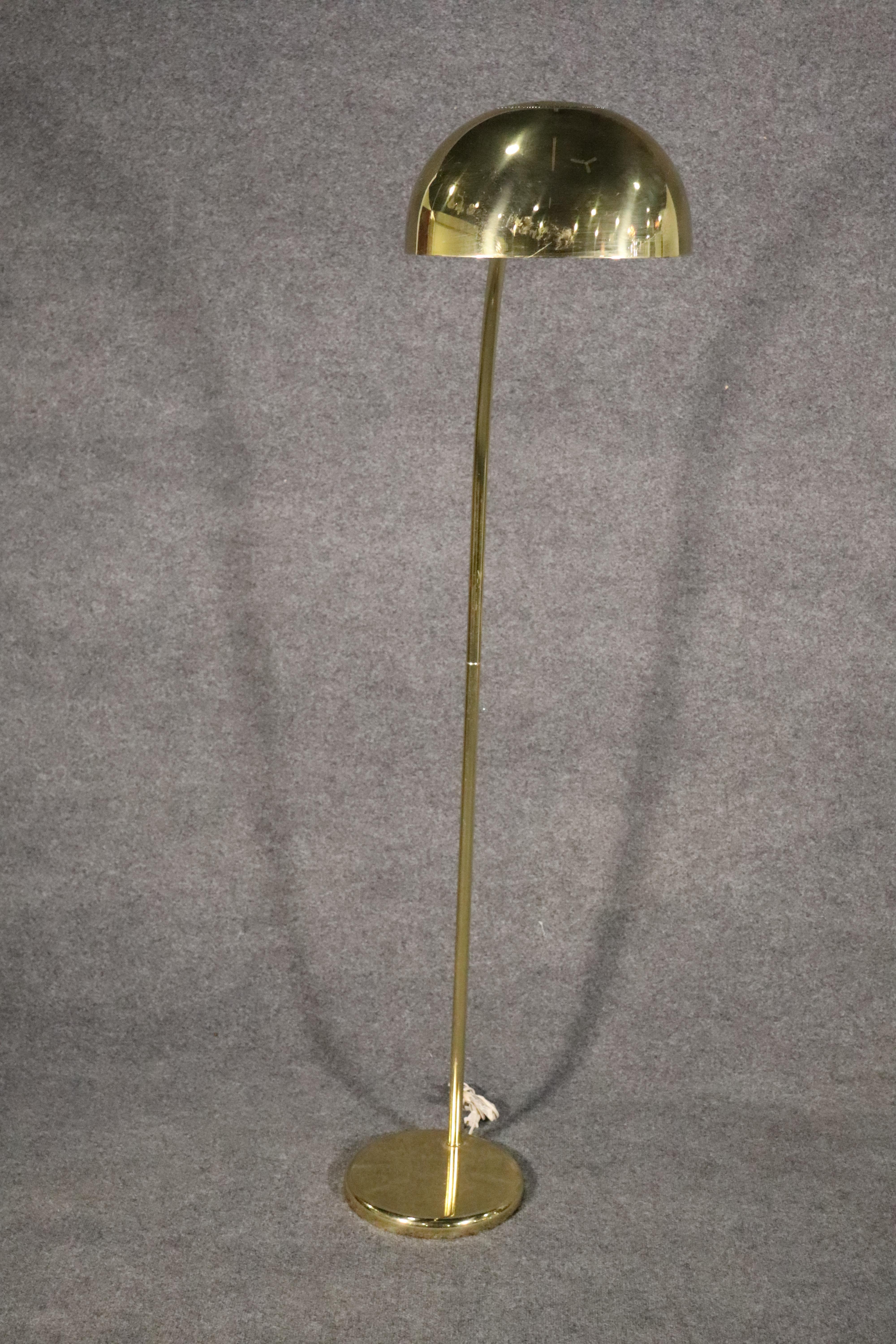 Vintage modern arch lamp in brass with polished finish. 
Please confirm location.