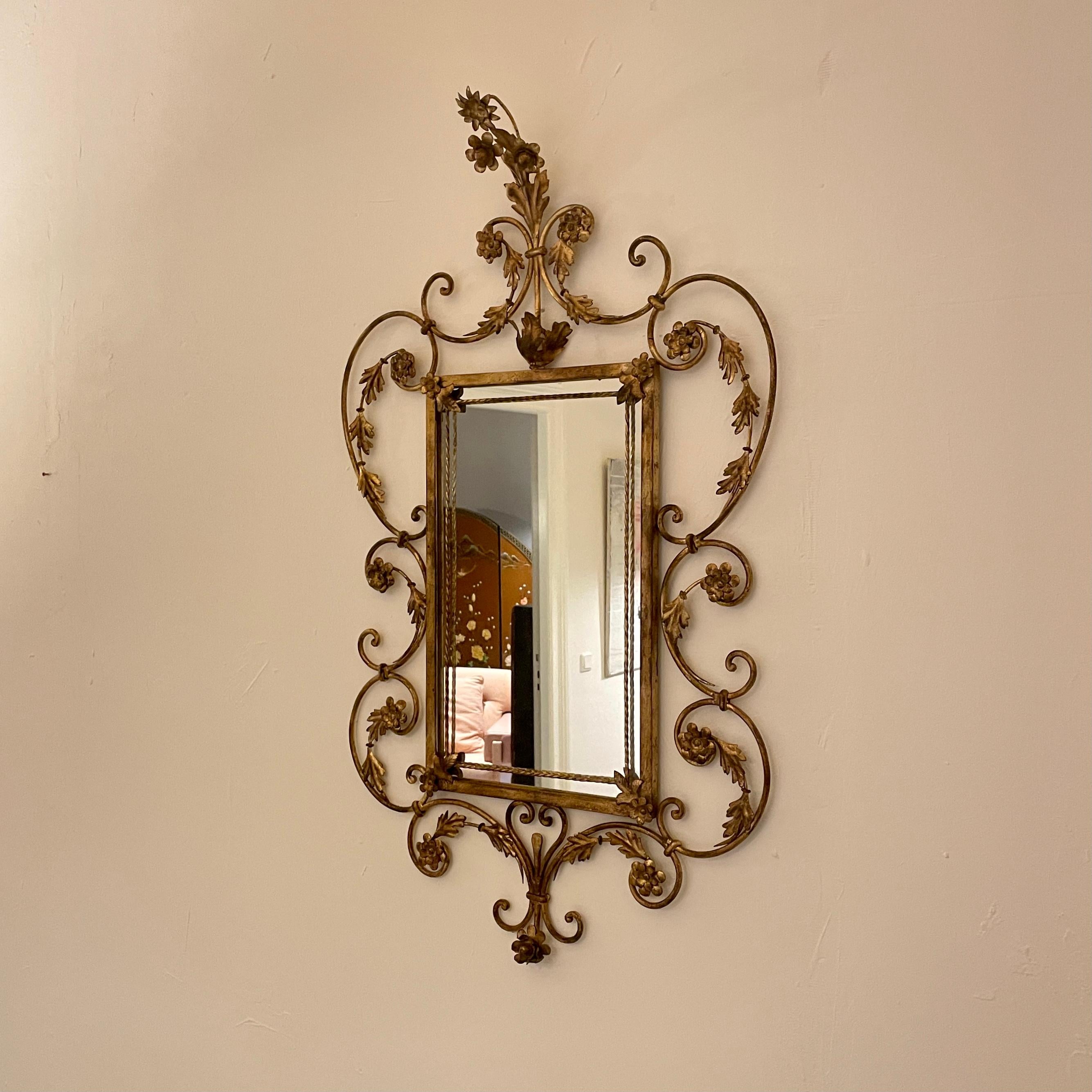 This one of a kind mid century brass floral sculpture mirror by Hans Kögl was made around 1970 for a privat Villa in Bavaria.
He did the whole interior for the house and this is one of the pieces.
The mirror has beautiful detail of flowers and
