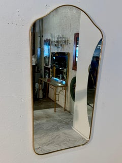 Mid-Century Brass Framed Wall Mirror with Curved Silhouette 1960s