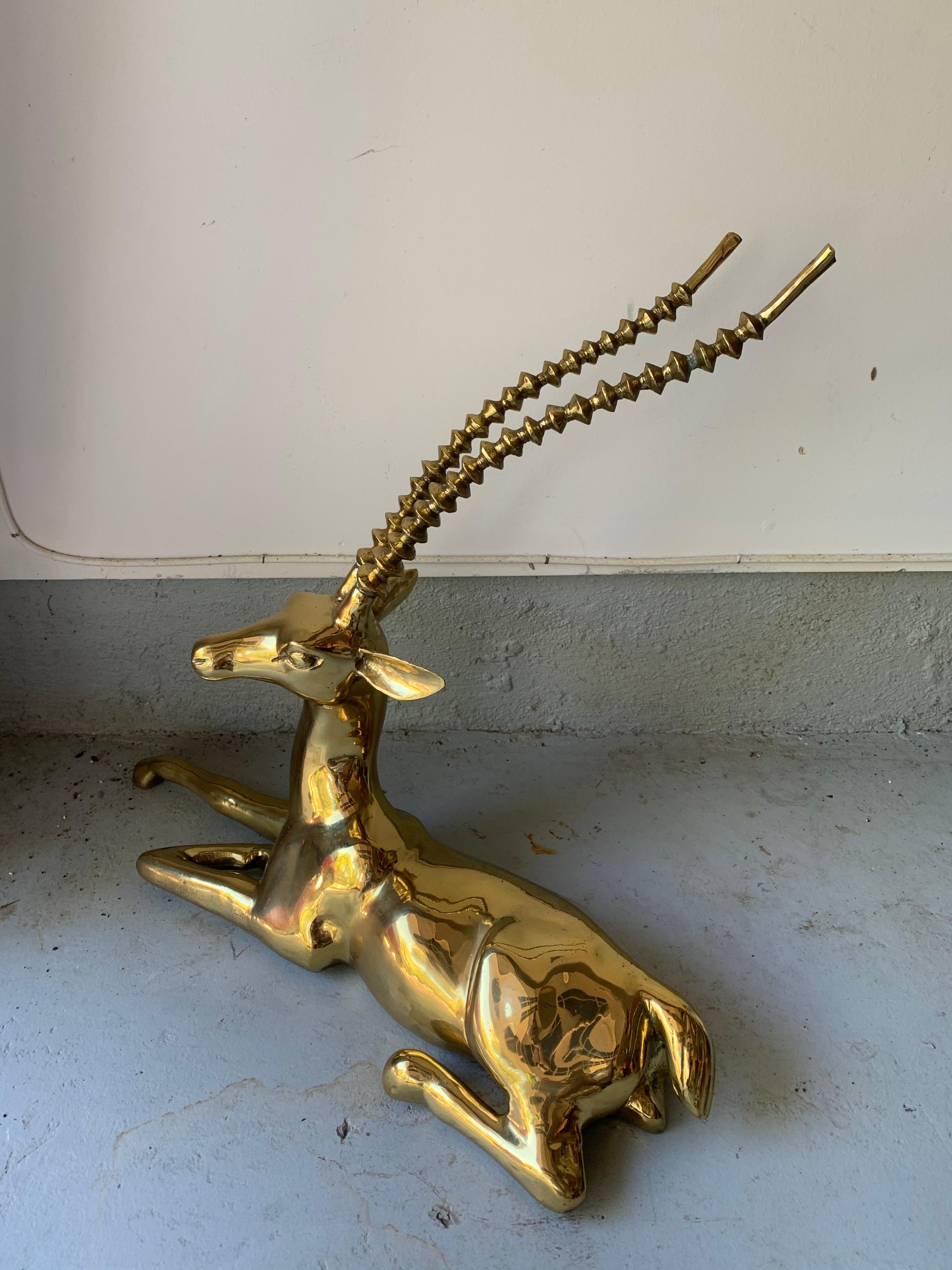 A large scale, solid polished brass gazelle or ibex sculpture. USA, circa 1960.

Unsigned.

Dimensions: 25 inches L x 8 inches D x 21 inches H.

 