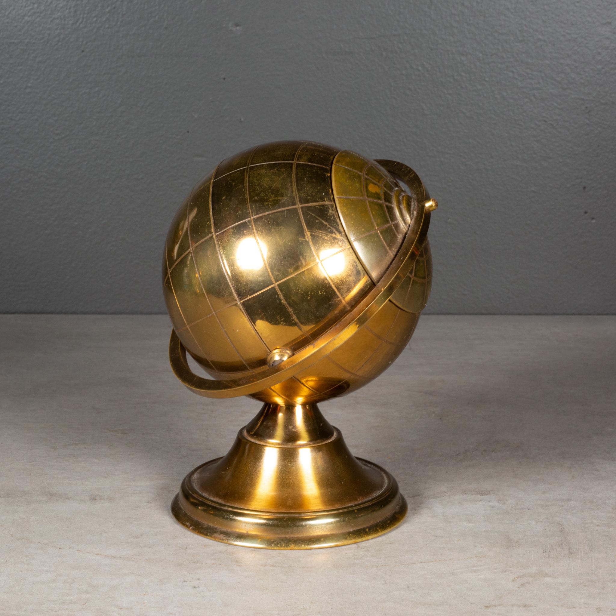 Metal Mid-century Brass Globe Cigarette Holder, circa 1960