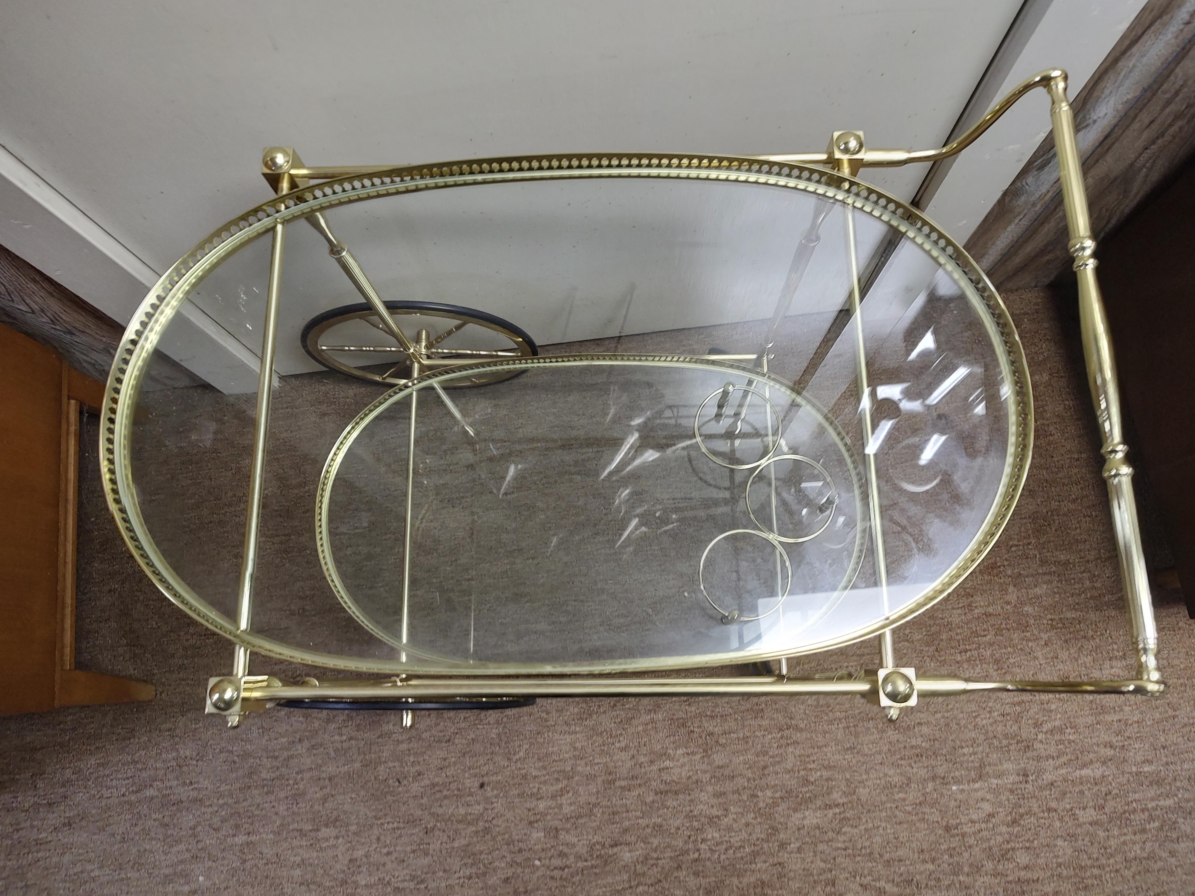 Cast Mid Century Brass Neoclassical Bar Cart with Oval Glass Shelves For Sale
