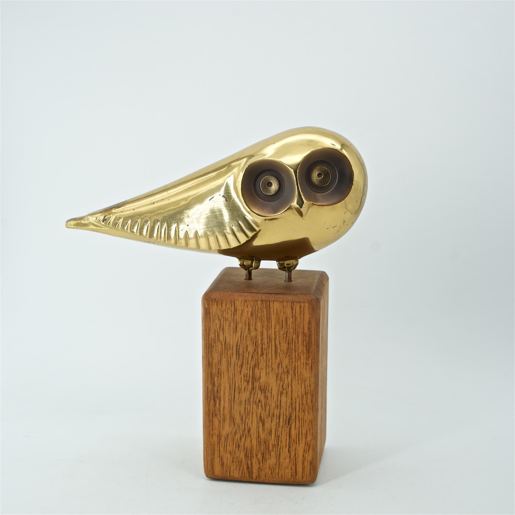 Rare series from the Curtis Jere Artisan House, USA, circa 1981, owl on wood plinth.