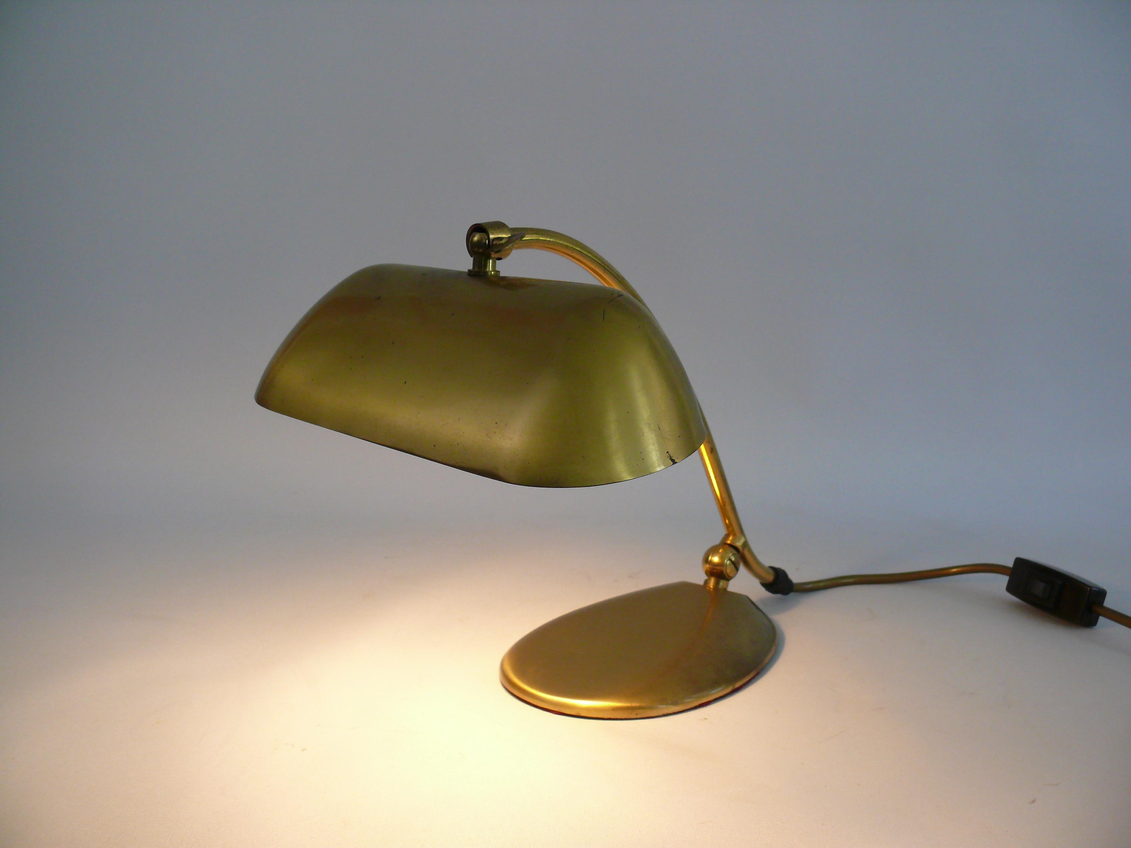 Very solid and rare piano lamp made of brass by JBS (Joseph Brumberg Sundern), West Germany, around the 1960s. The lamp impresses with its organic shape. The lamp is made of brass with a heavy metal base. The screen can be tilted with a thumbscrew.