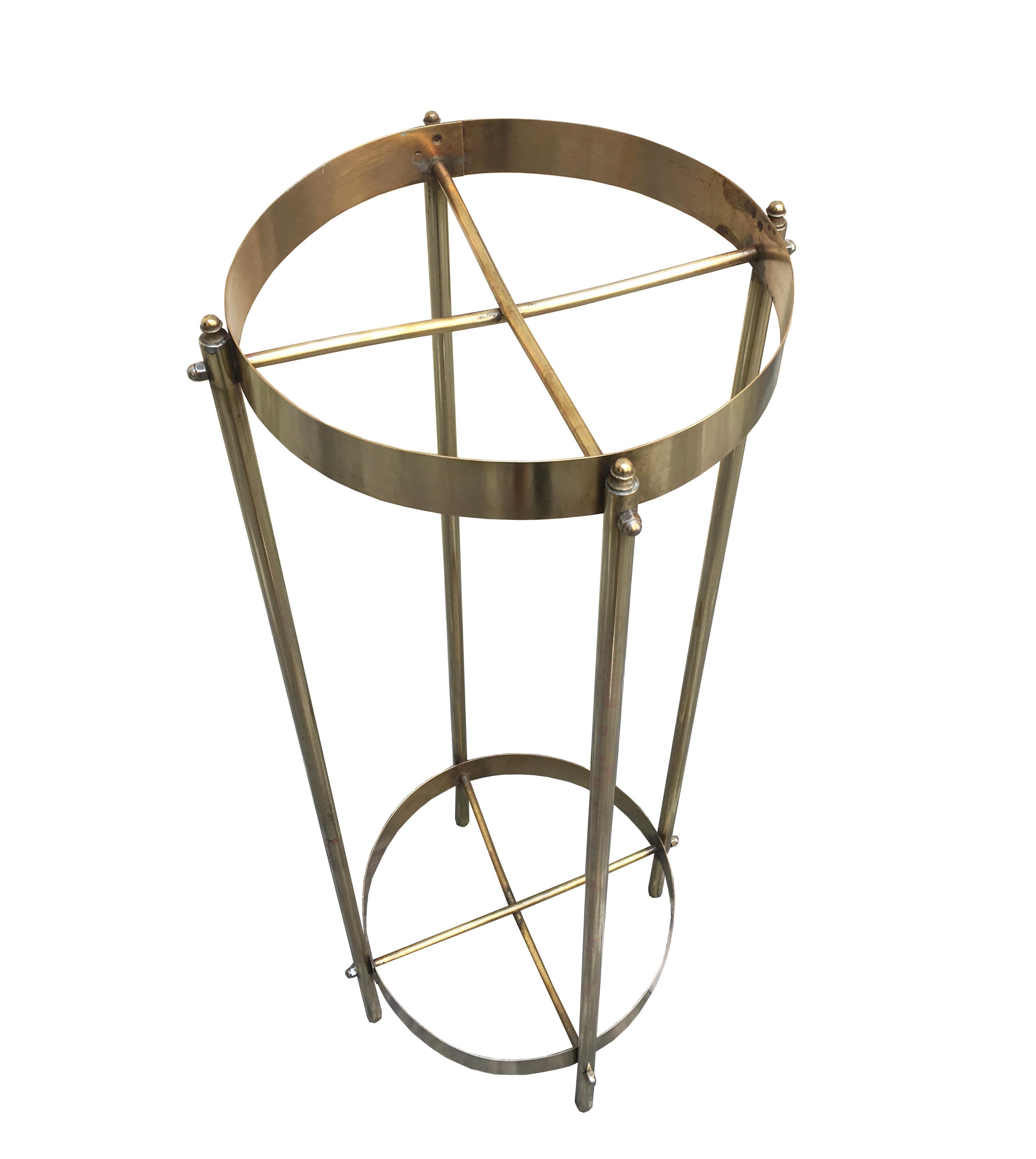 Beautiful brass plant holder made in Italy in the 1960s. It is in polished brass with 2 shelves, which can also be used as an elegant pedestal.