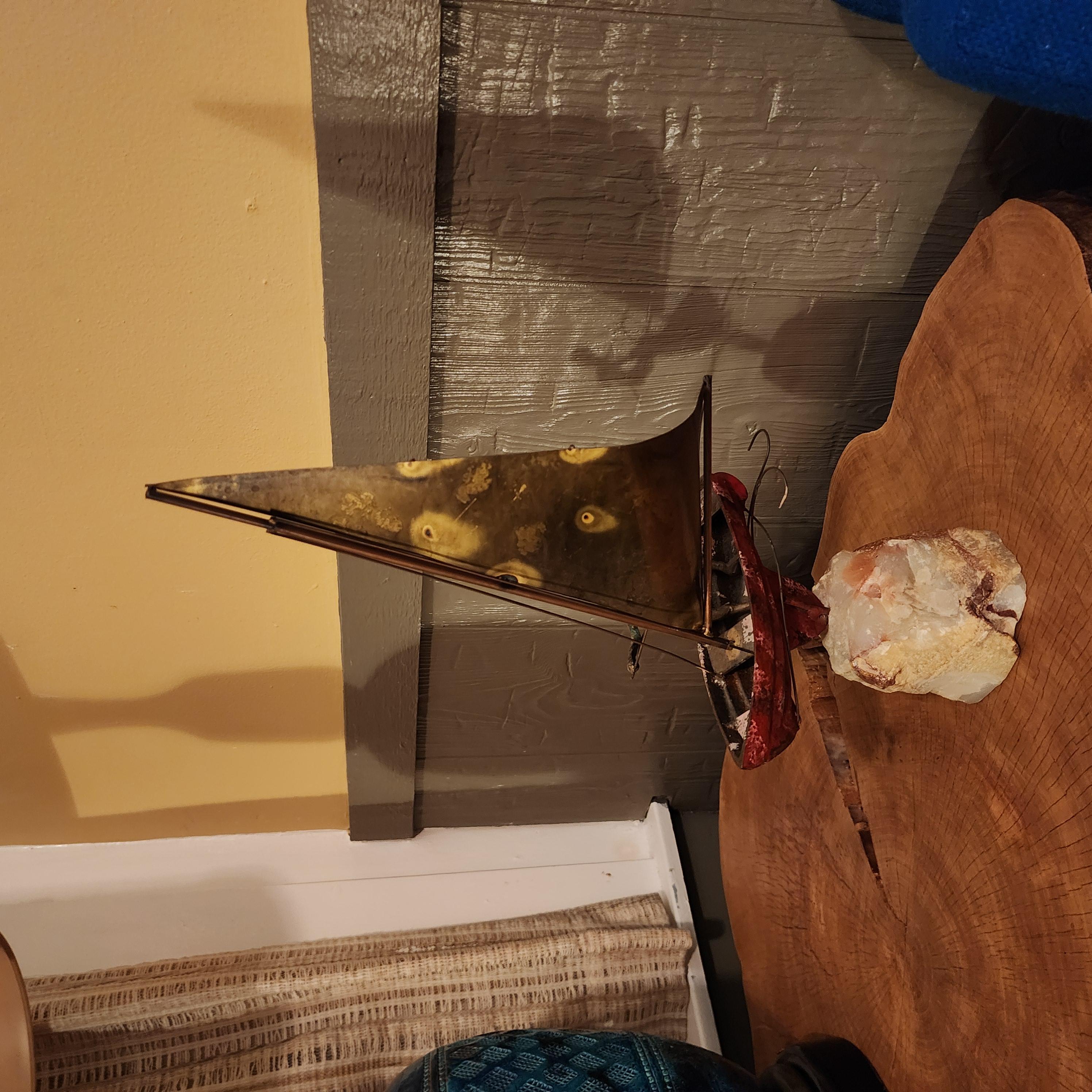 This is a great vintage brass sailboat art sculpture by Curtis Jere. Set on stone it has great texture and color. There is patina on the brass. This would be great in any setting.