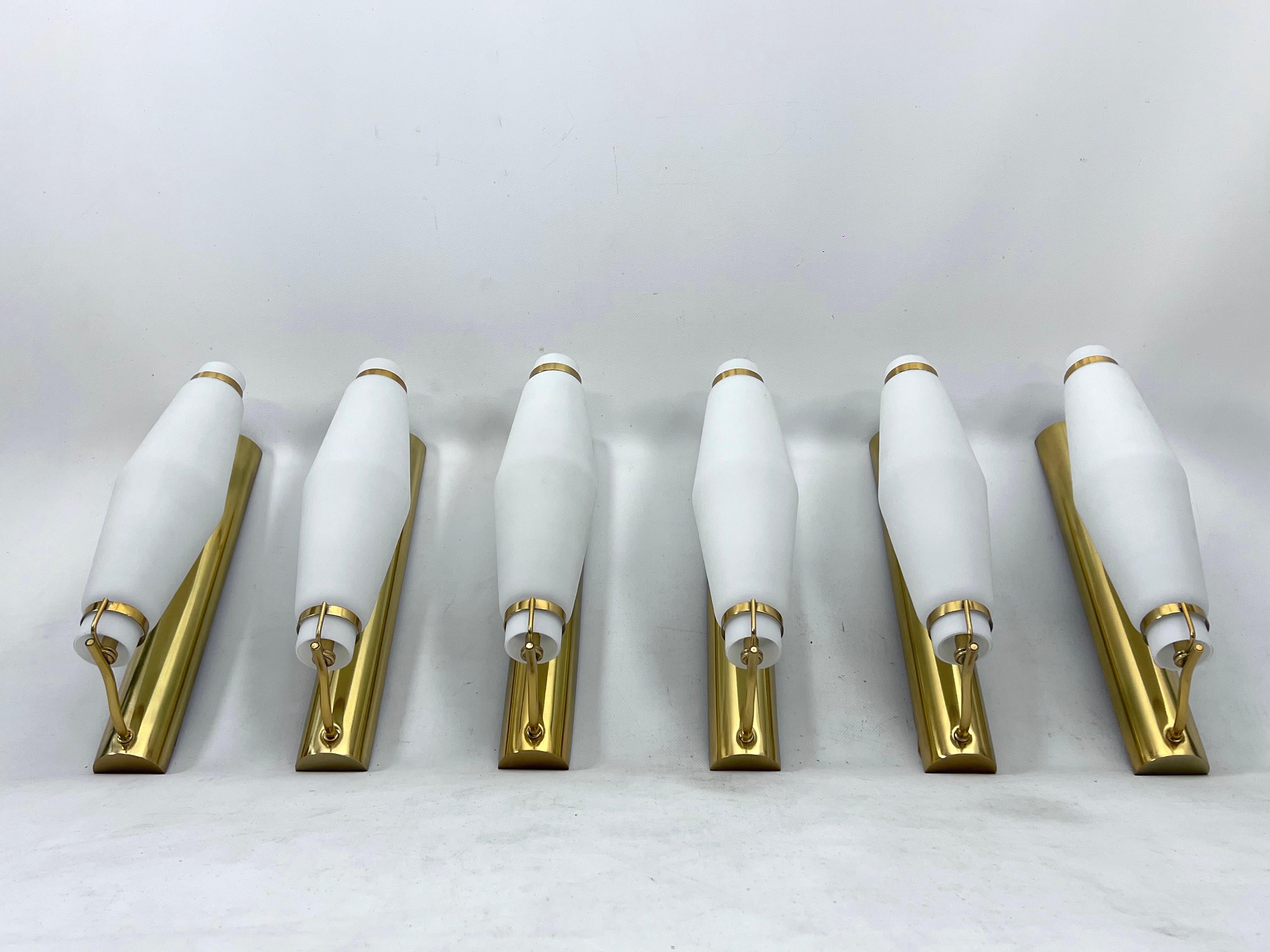 20th Century Mid-century brass sconces in the manner of Stilnovo from 50s. Set of six For Sale