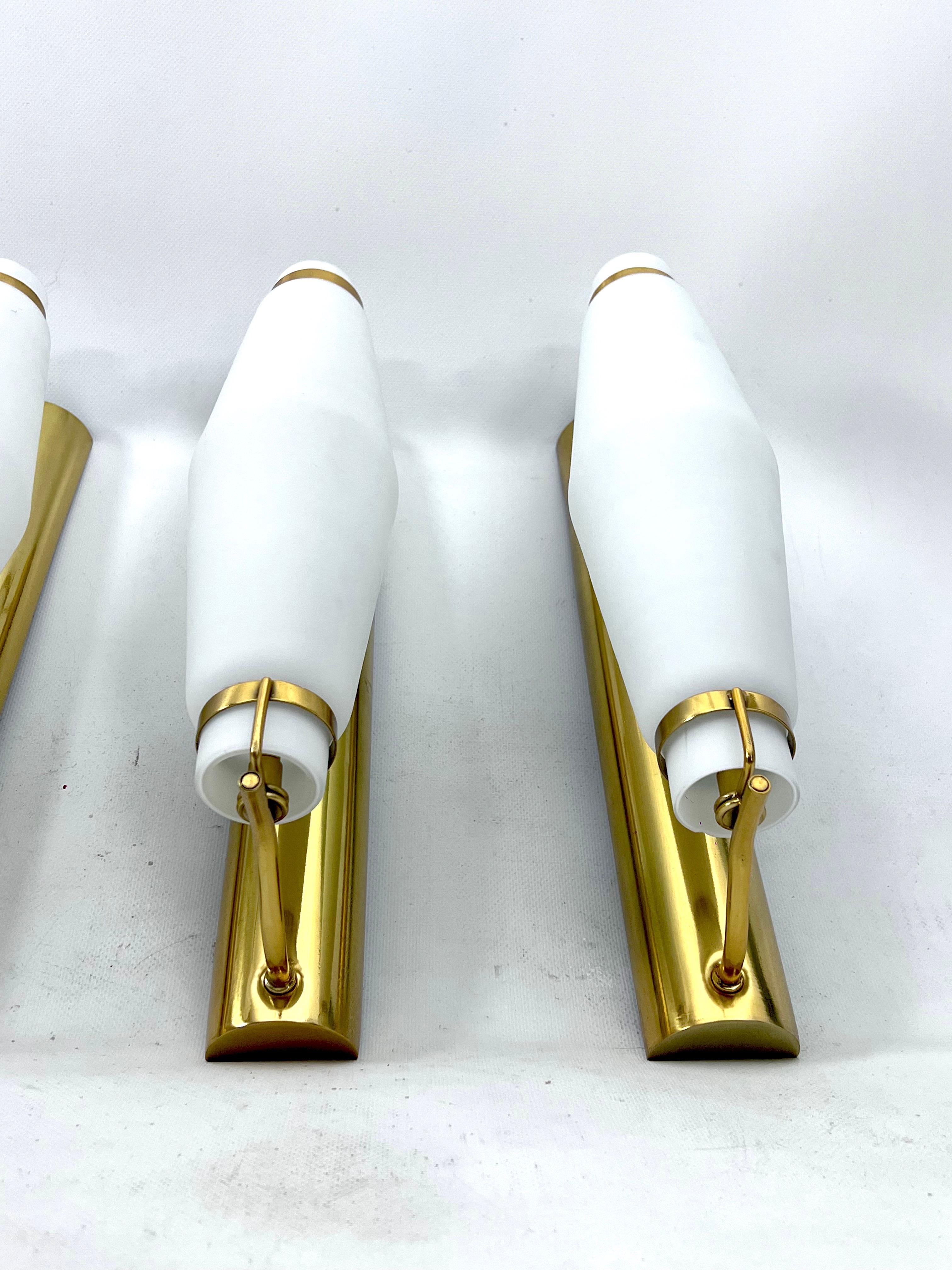 Opaline Glass Mid-century brass sconces in the manner of Stilnovo from 50s. Set of six For Sale