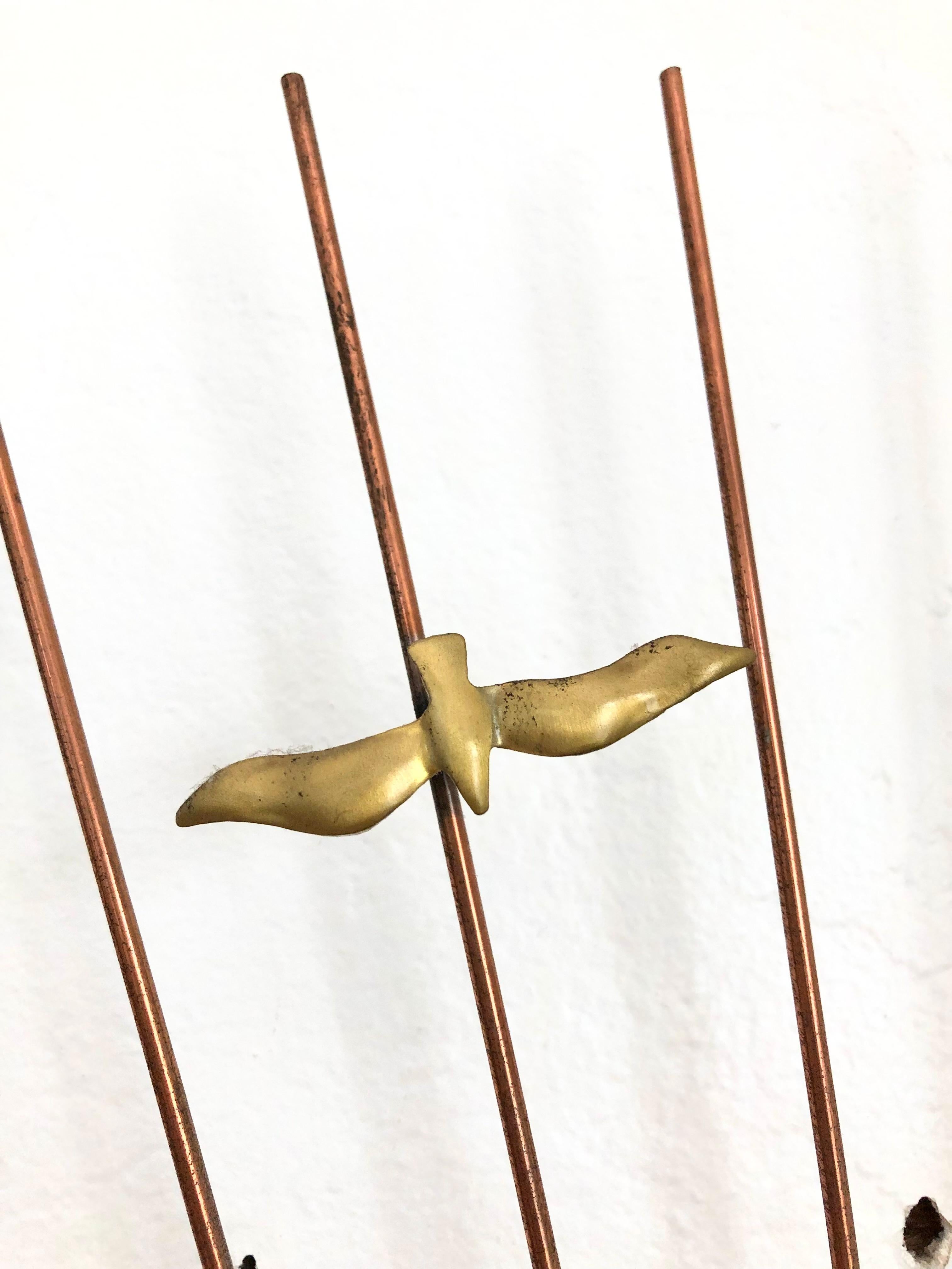 brass bird wall art