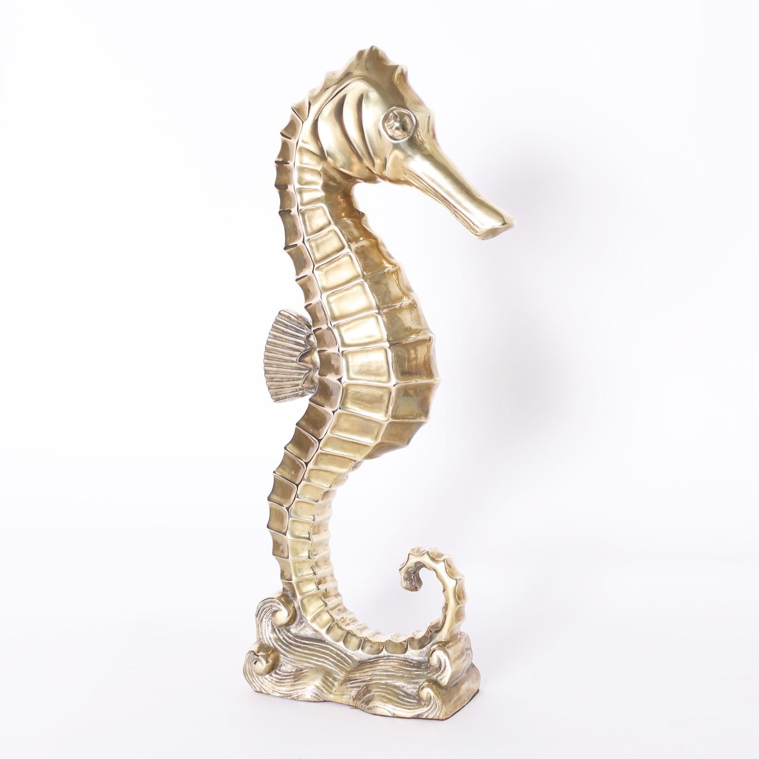 Striking pair of vintage cast brass seahorse sculptures or objects of art with a dramatic stylized form. Priced individually. 

Measurements:

Left measures H: 18.5 W: 8 D: 4  Ref: 6547

Right measures H: 17.5 W: 8 D: 3.5  Ref: 6530.