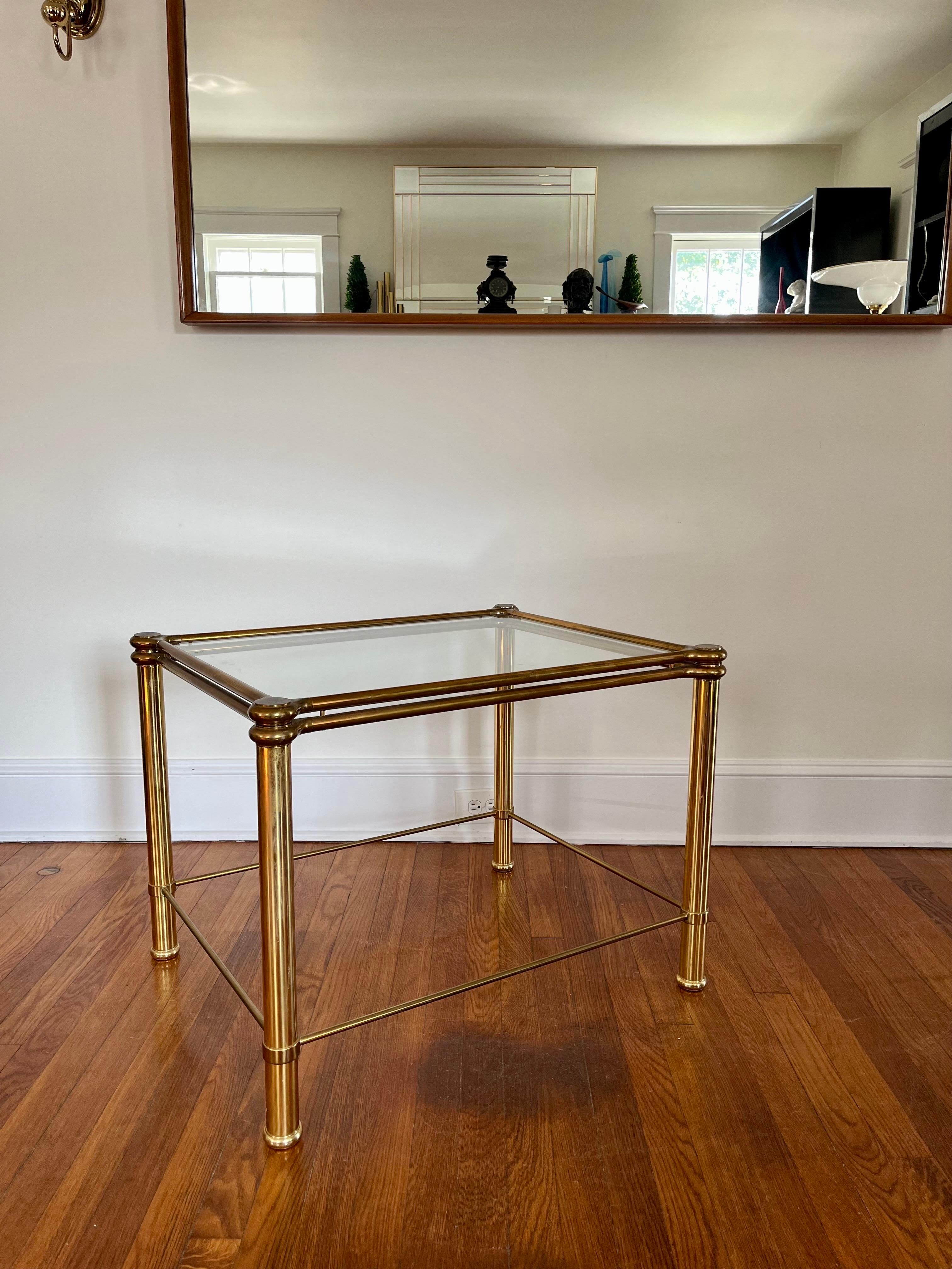 Beautiful brass and glass side or cocktail table. Great detail with rounded corners and stretcher design. Inset glass for clean finished look. Nice patina.
Curbside to NYC/Philly $400