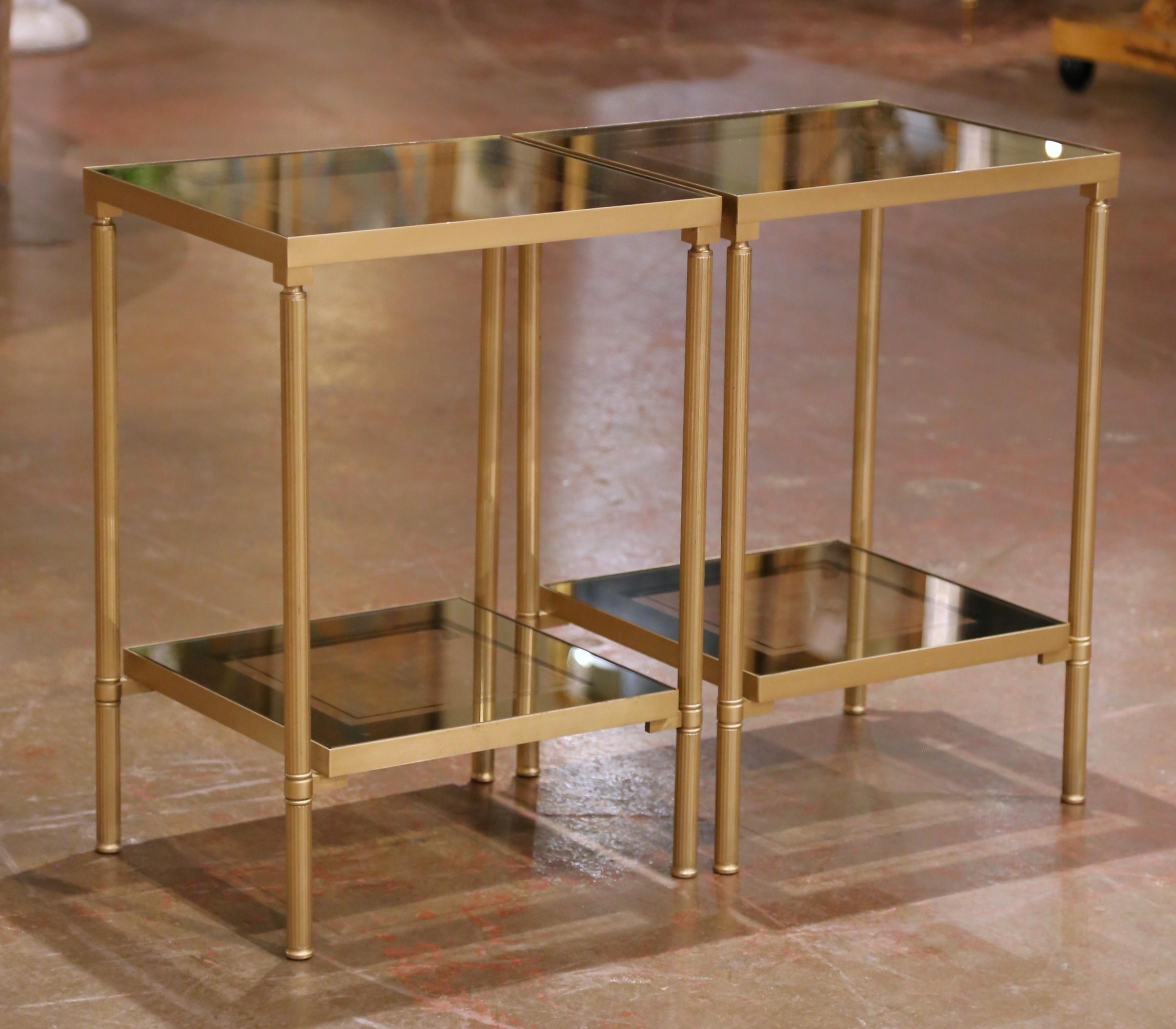 This refined pair of mid-century French side tables is attributed to Maison Jansen and exemplifies the firm’s sophisticated blend of classicism and modern restraint. Crafted circa 1950–1960, each table measures 17 inches wide by 14 inches deep and