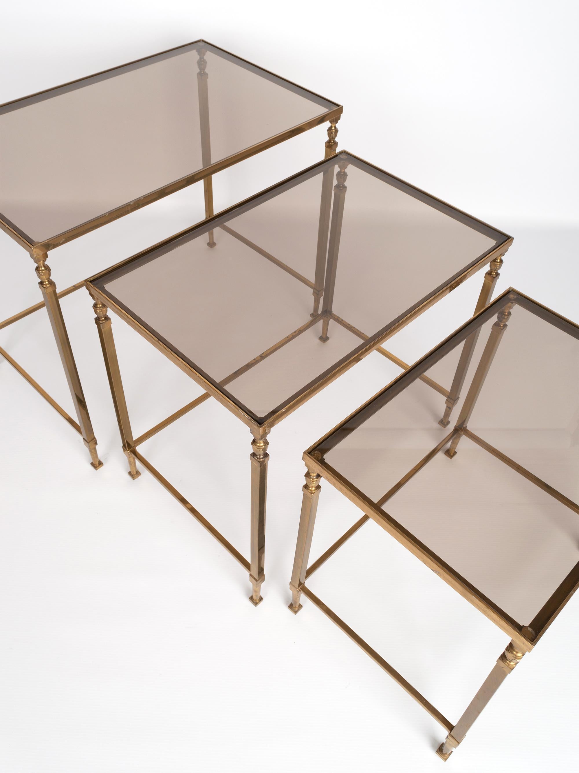 Midcentury Brass and Smoked Glass Nesting Tables by Maison Baguès, France In Good Condition For Sale In London, GB