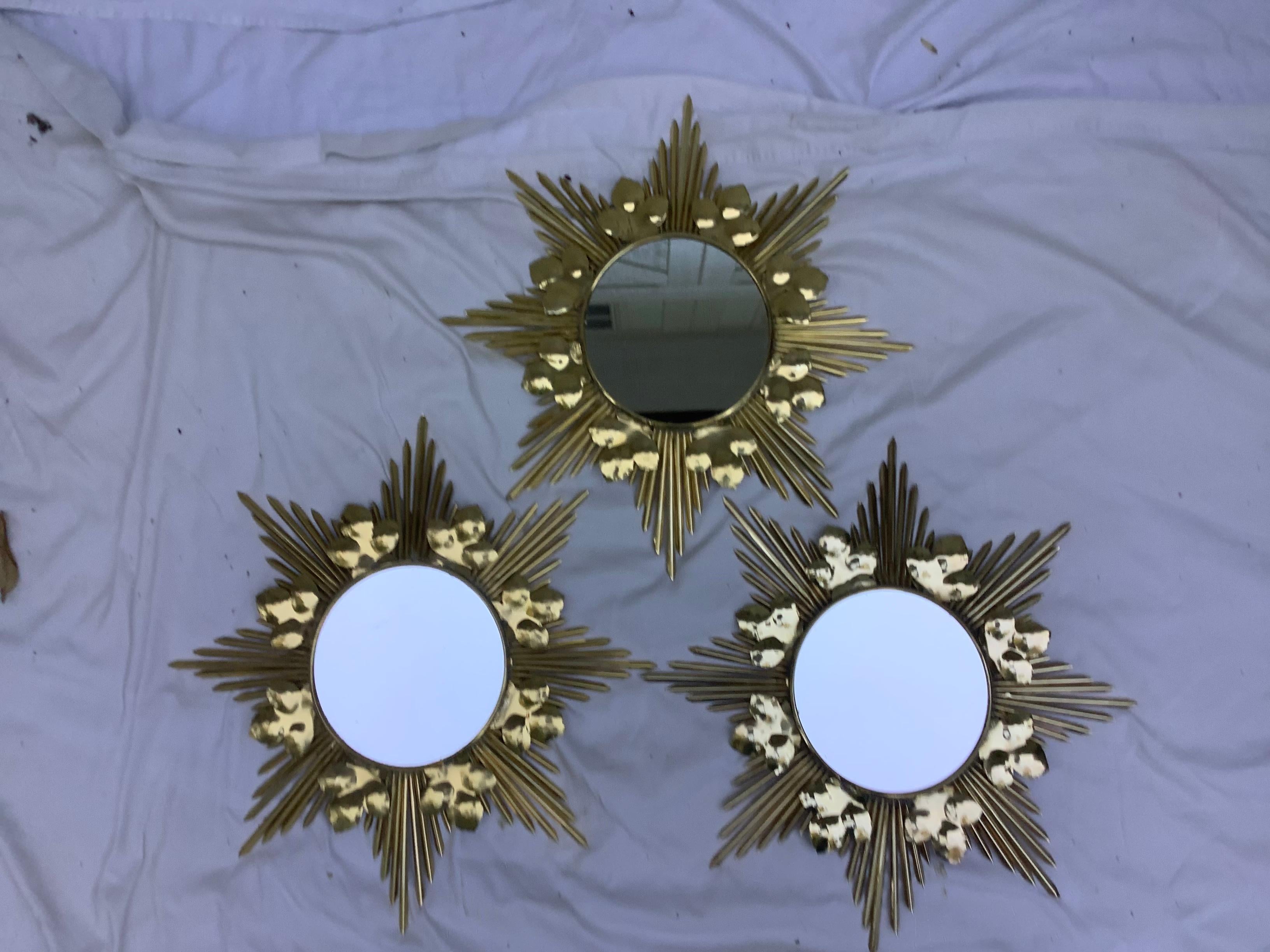 I bought some “new old stock”, of these brass sunbursts, that were originally German clocks. I replaced the clocks with mirrors. I thought they turned out quite well! The mirror, itself, measures 7.5” D. The mirrors measure 19” D at the widest point.