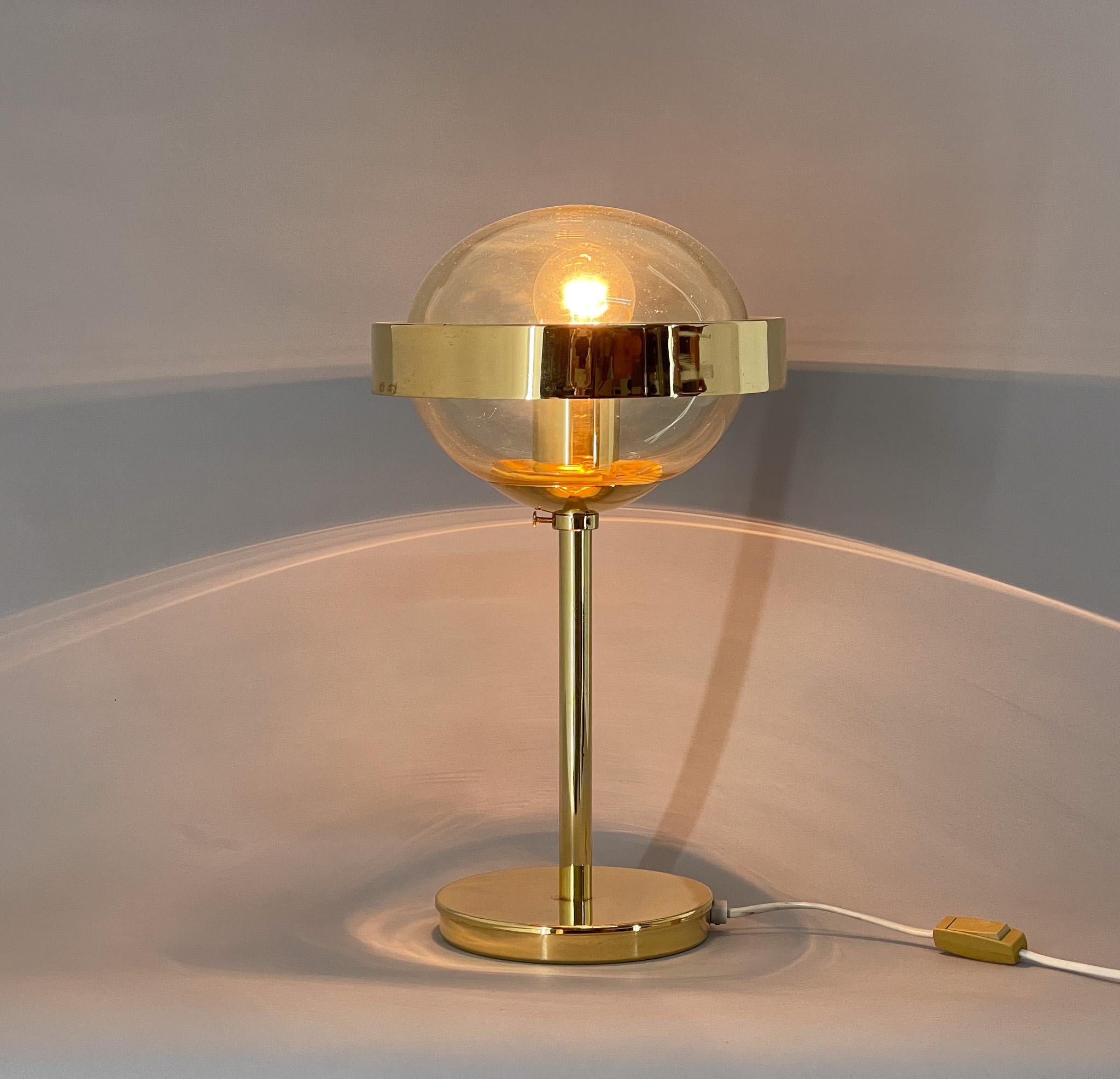 Vintage brass and glass table lamp, produced by famous Kamenicky Senov Glassworks in former Czechoslovakia in the 1960's. 
Bulb: 1x E25-E27. US plug adapter included.