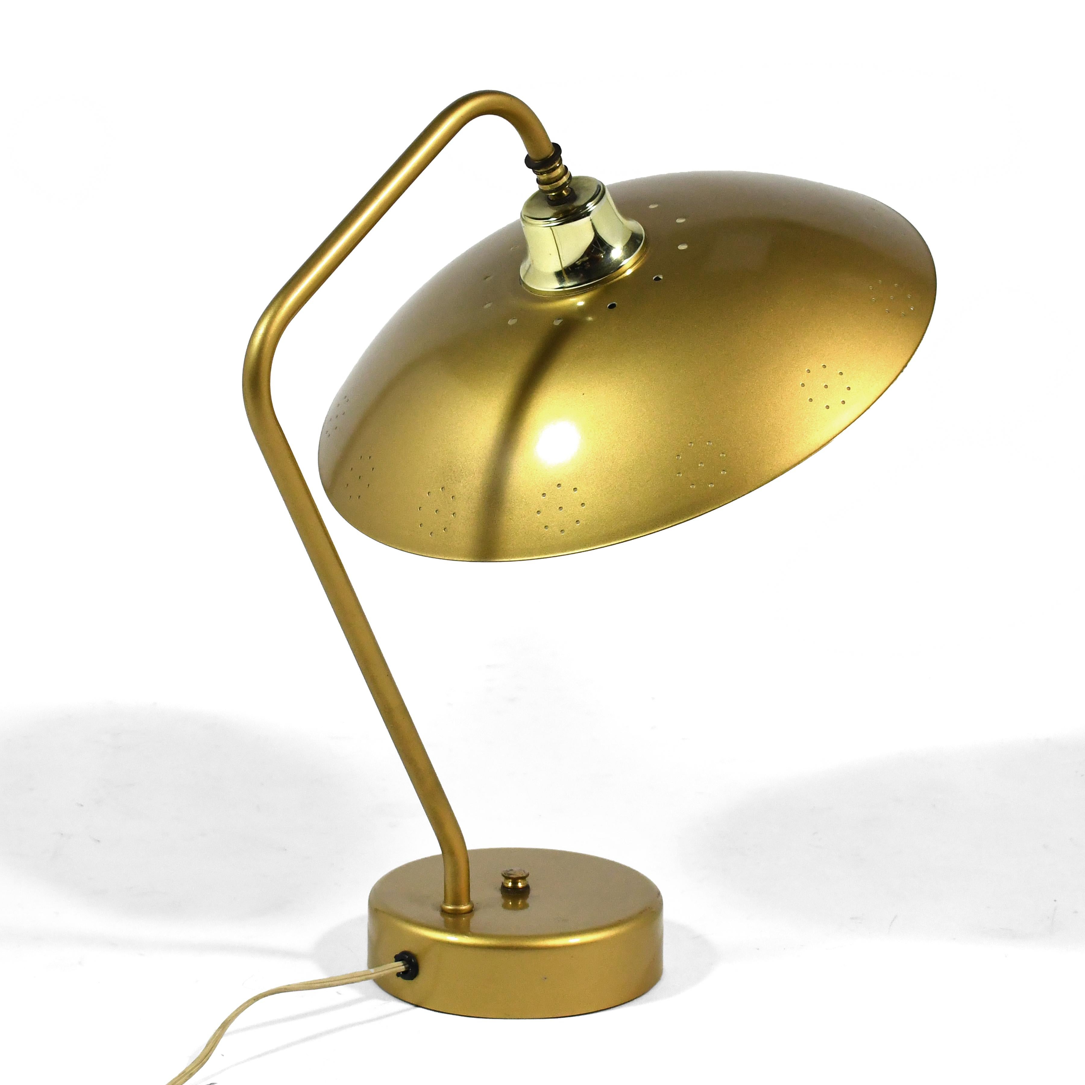This lovely 1950s desk lamp is so shockingly clean, we don't think it has ever been used. The design is obviously inspired by lamps designed by Greta Grossman, Kurt Versen and Gerald Thurston, but we do not know the maker. The plastic diffuser is