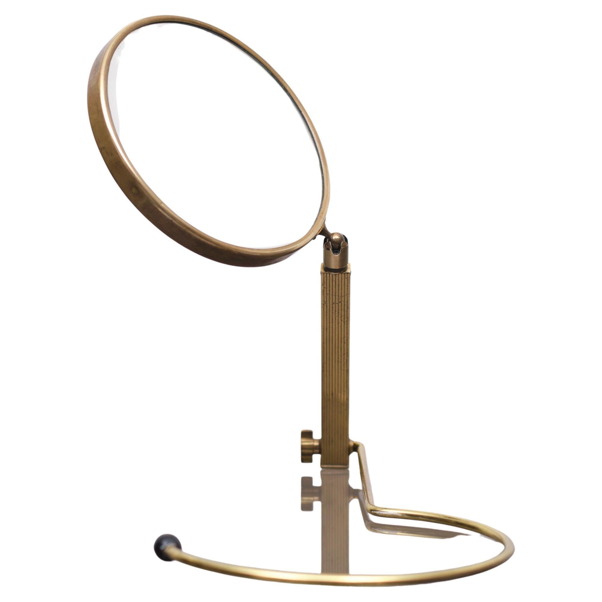 Such a clever design, this brass table or wall mirror. Adjustable in 
several ways. Very nice quality. 1950s France.