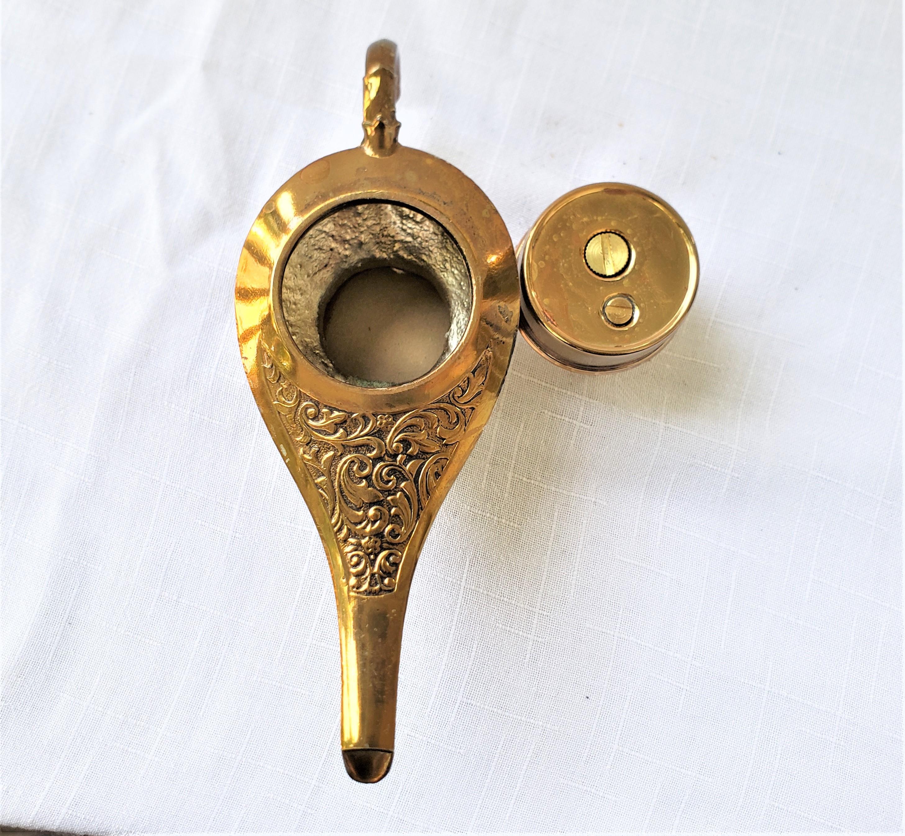 20th Century Mid-Century Brass Toned Figural Aladdin's Oil Lamp Styled Table Lighter For Sale