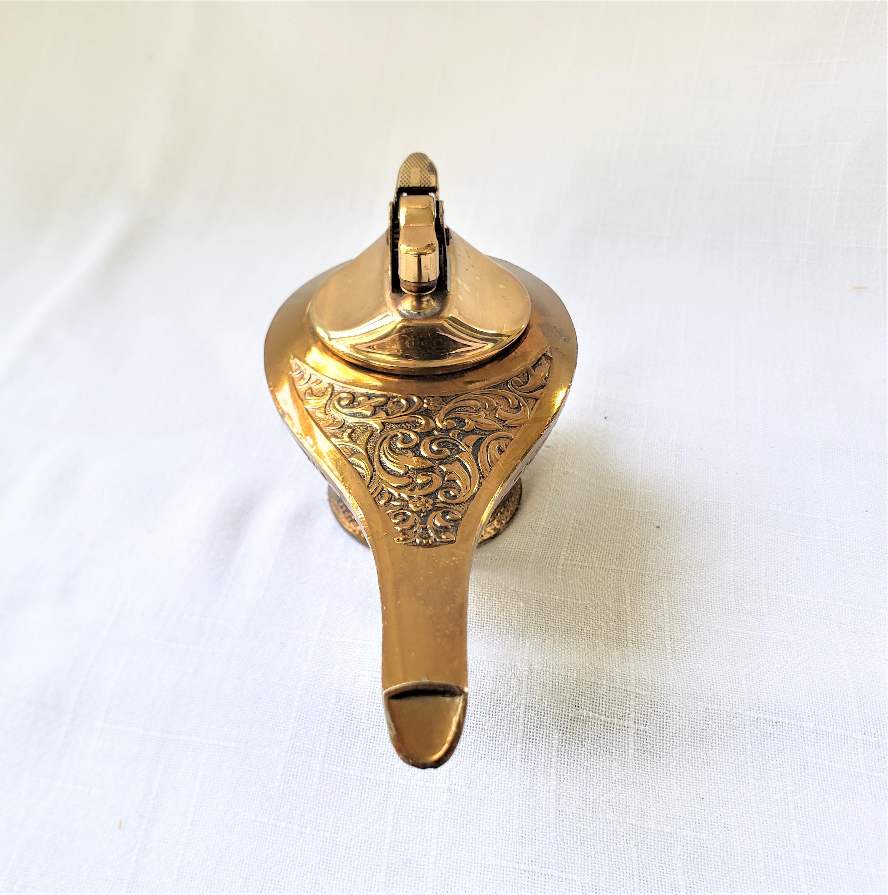 Mid-Century Modern Mid-Century Brass Toned Figural Aladdin's Oil Lamp Styled Table Lighter For Sale