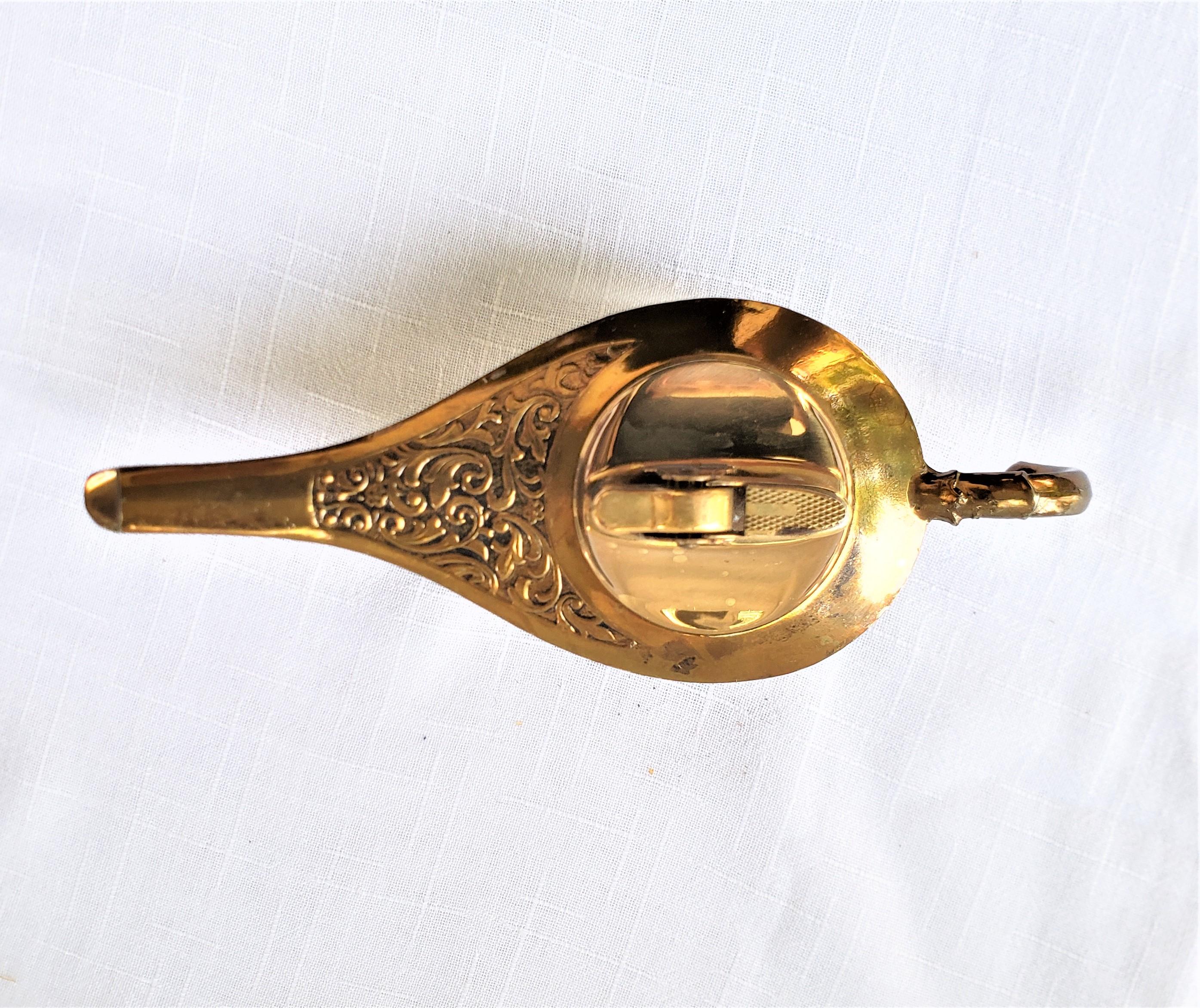 Japanese Mid-Century Brass Toned Figural Aladdin's Oil Lamp Styled Table Lighter For Sale