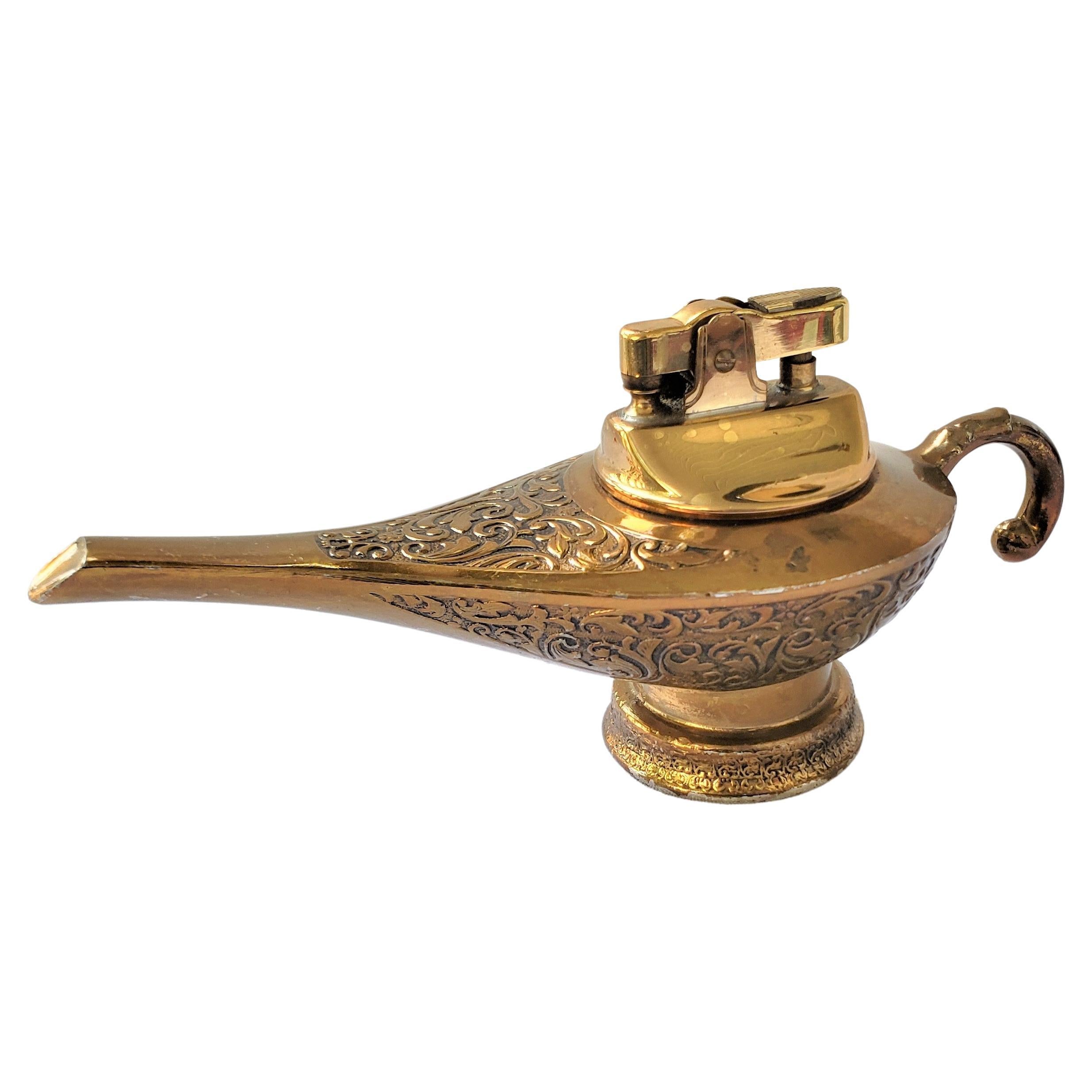 Mid-Century Brass Toned Figural Aladdin's Oil Lamp Styled Table Lighter For Sale