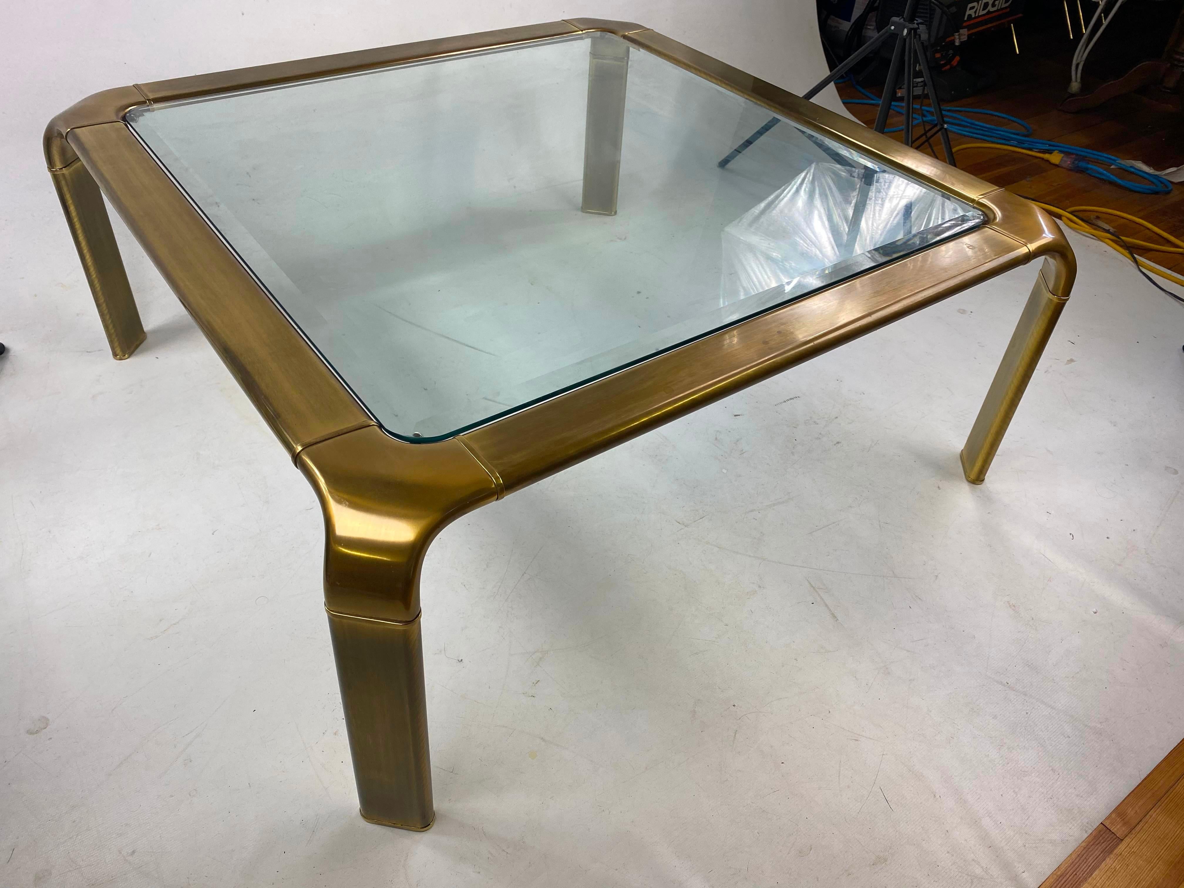 Great brass coffee table. The table looks absolutely amazing and has nice beveled glass.
 
