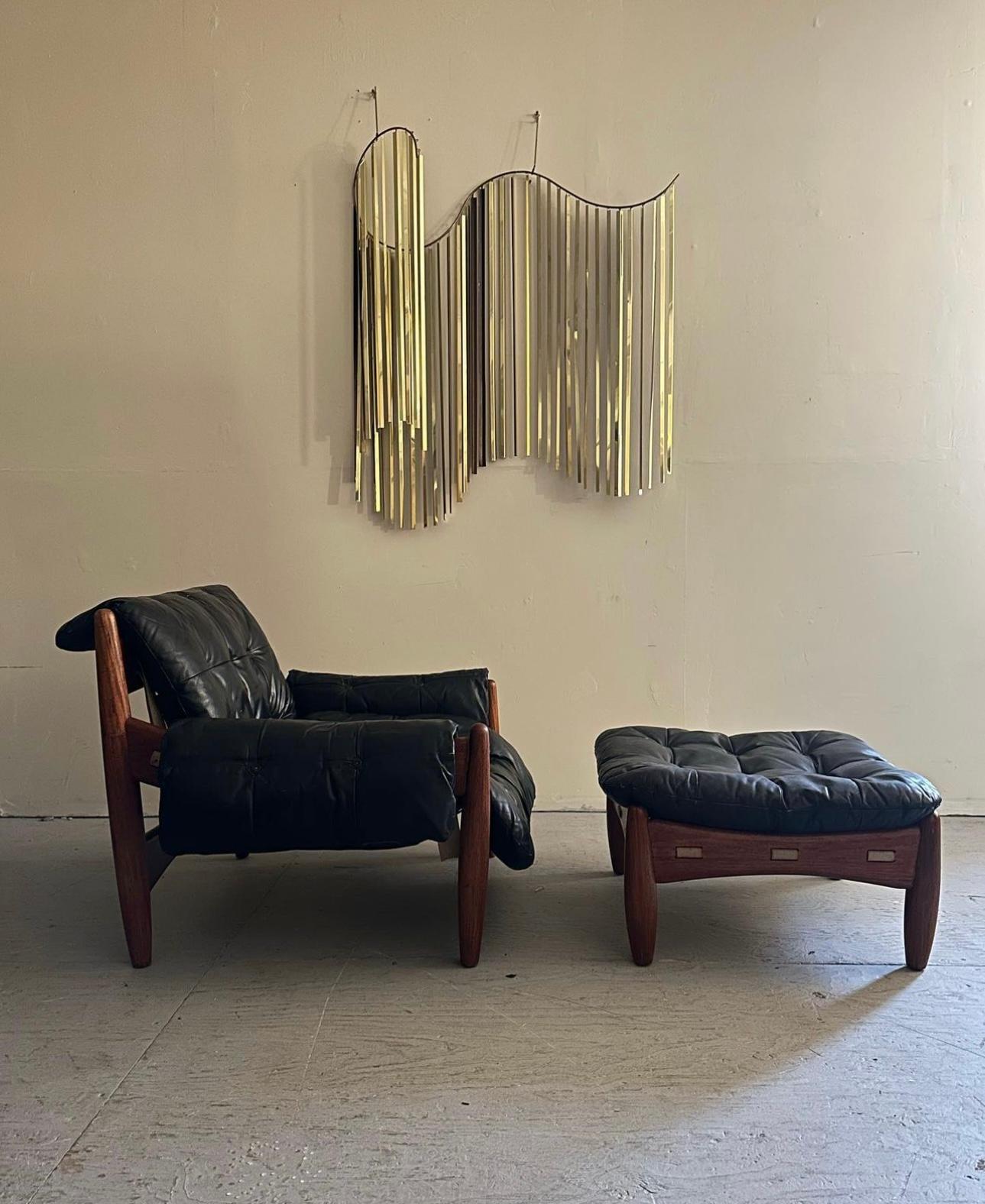 Mid Century Brazilian Modern “Sheriff” Lounge Chair Designed By Sergio Rodrigues. Originally designed in 1957, this chair took first prize at the IV Concorde Internazionale del Mobile competition in 1961. This iconic chair features a solid Brazilian