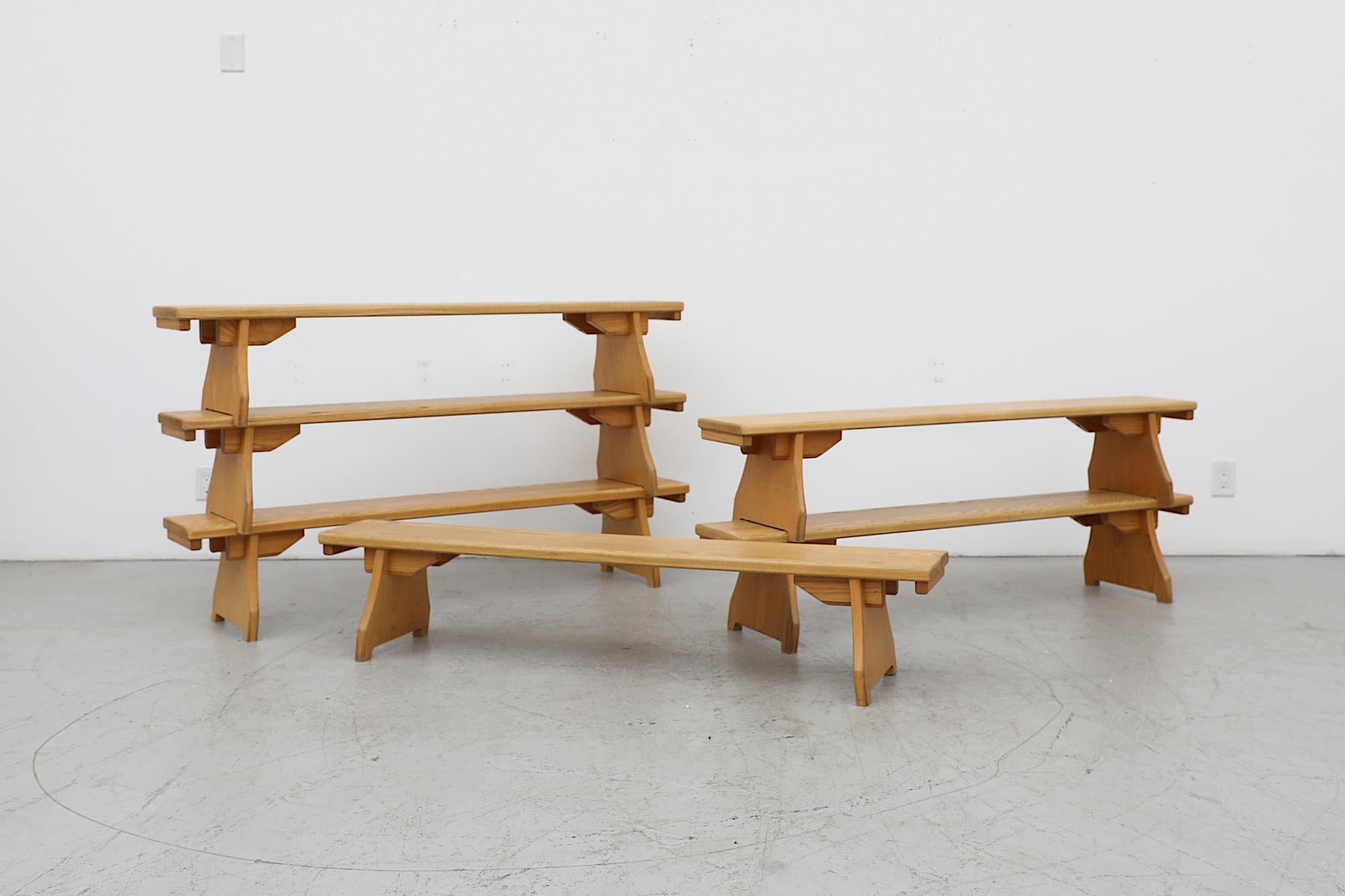 Mid-Century Børge Mogensen style trestle base pine benches with wide decorative legs. Each bench is in original condition with similar visible wear consistent with their age and use. Condition may vary from photos. Sold Individually.