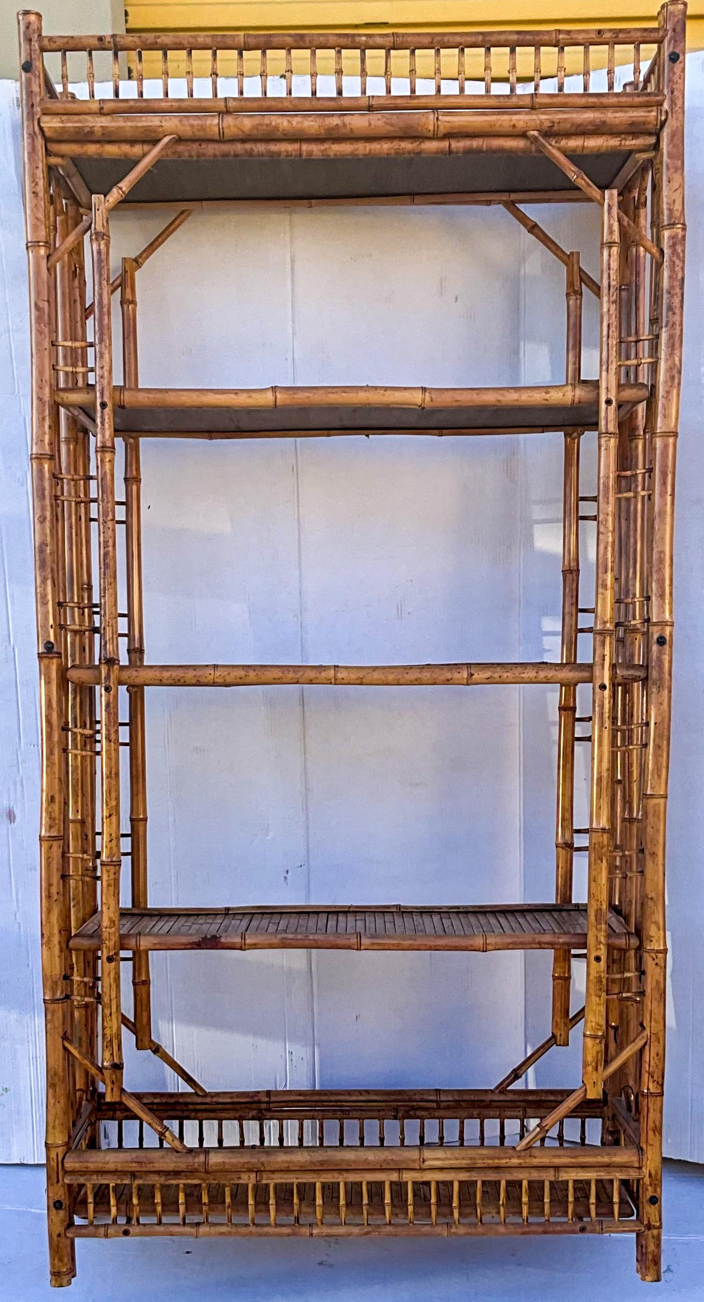 This is a burnt bamboo etagere with English Brighton Pavilion styling. The shelves are removable, and it is structurally sound. It is unmarked and is most likely a midcentury piece.

My shipping is for the Continental US only.