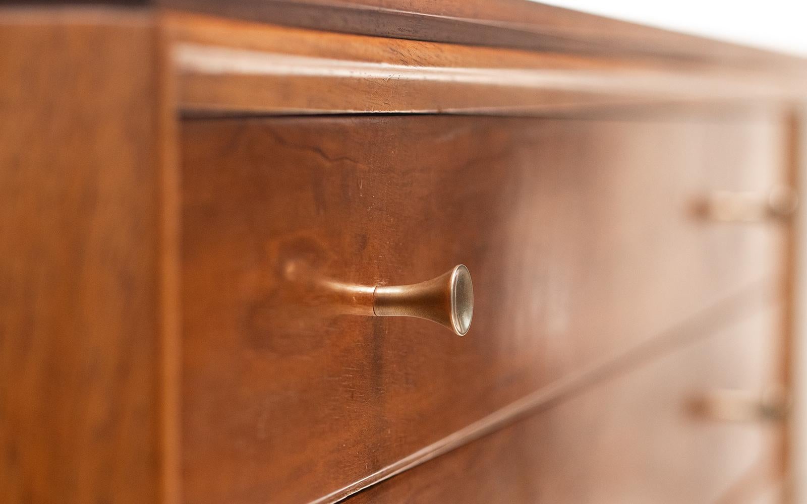 Archie Shine Sideboard

Robert Heritage for Archie Shine 'Hanover' sideboard, with four drawers, recessed brass trumpet-shaped handles inset into the Rosewood. Two doors are enclosing a storage area with an internal shelf.

East London furniture