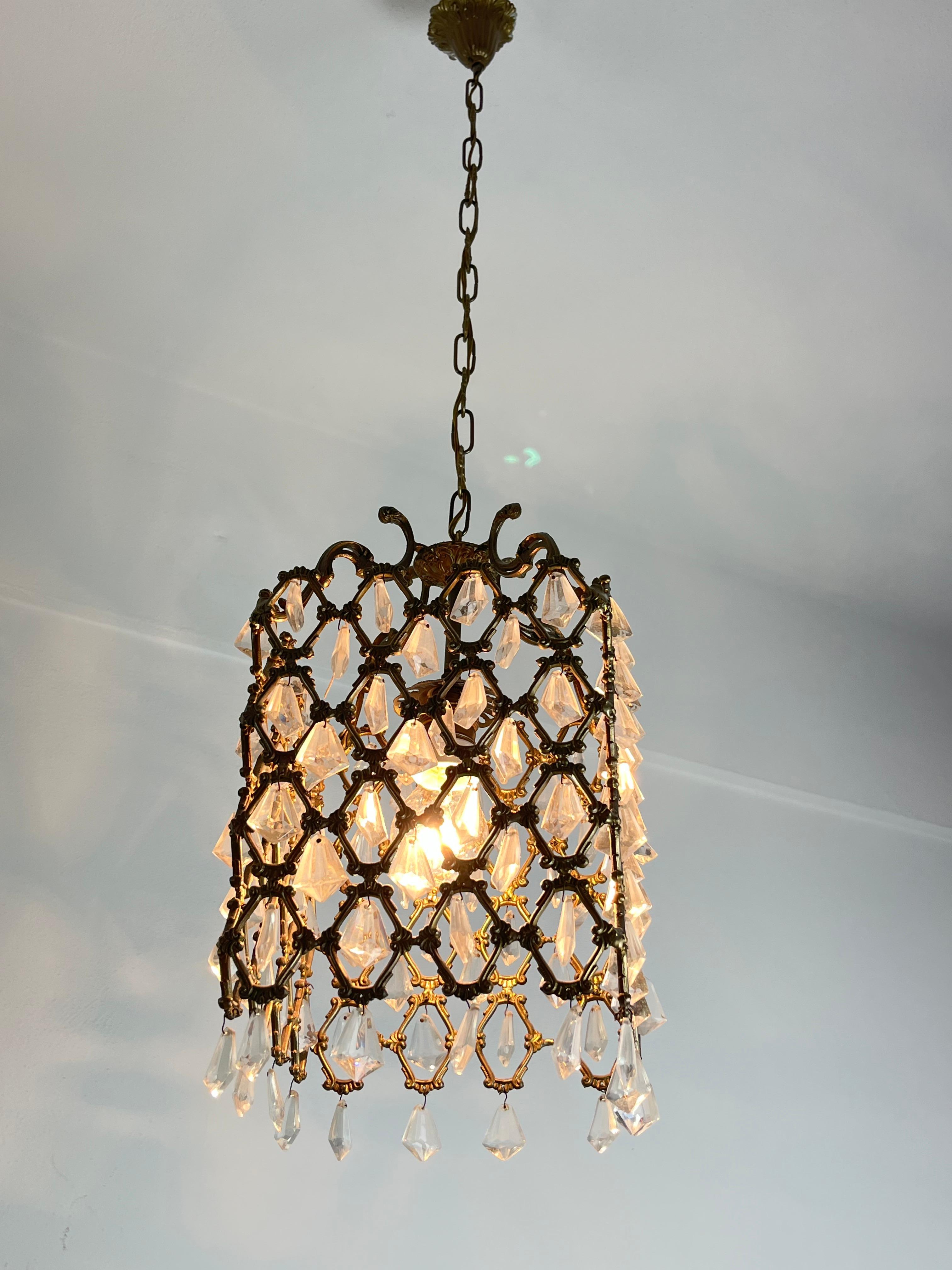 Mid-Century bronze and crystal chandelier attributed to Maison Baguès France 1940s
Good condition, E27 lamp, small signs of aging.