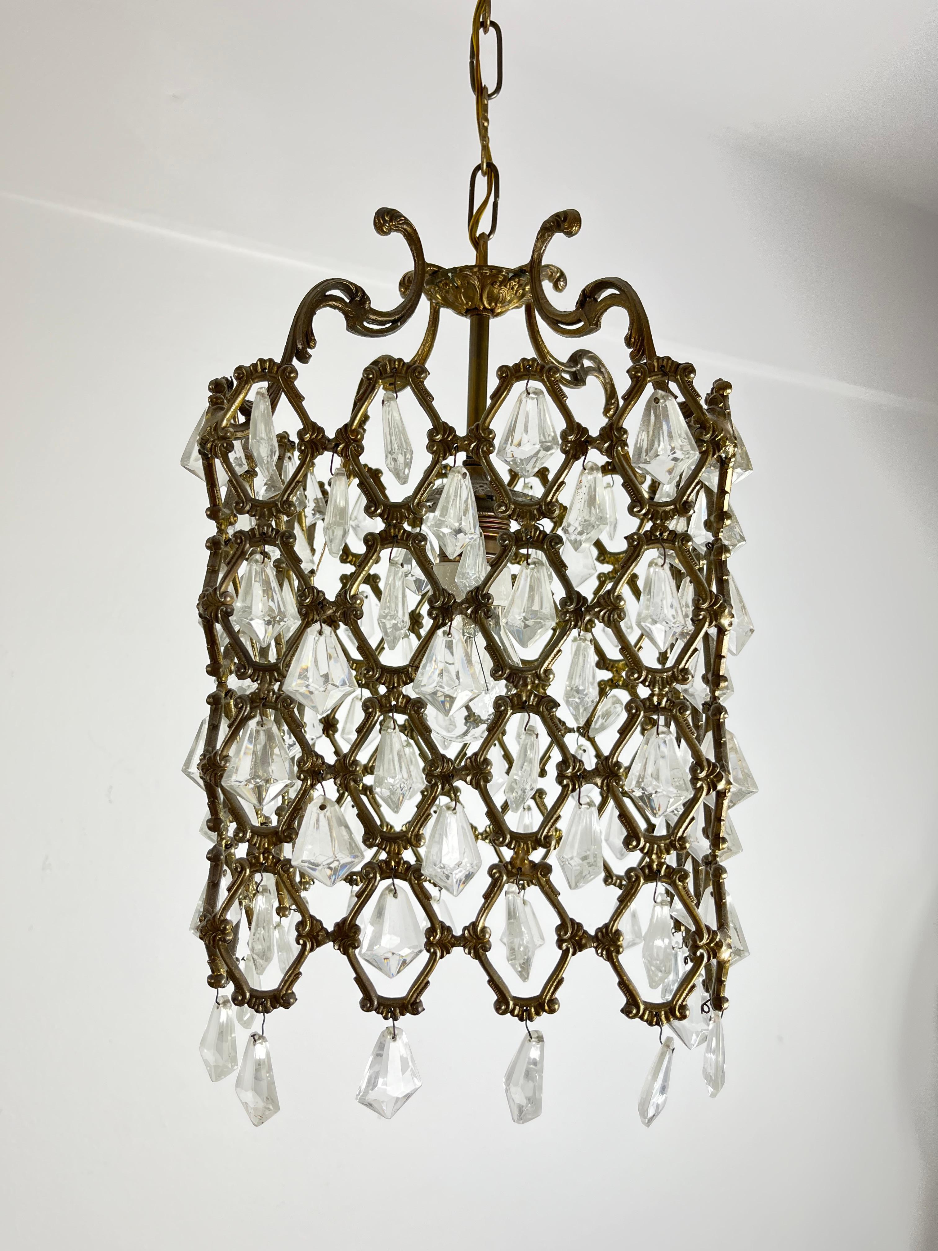 French Mid-Century Bronze And Crystal Chandelier Attributed To Maison Baguès  1940s For Sale