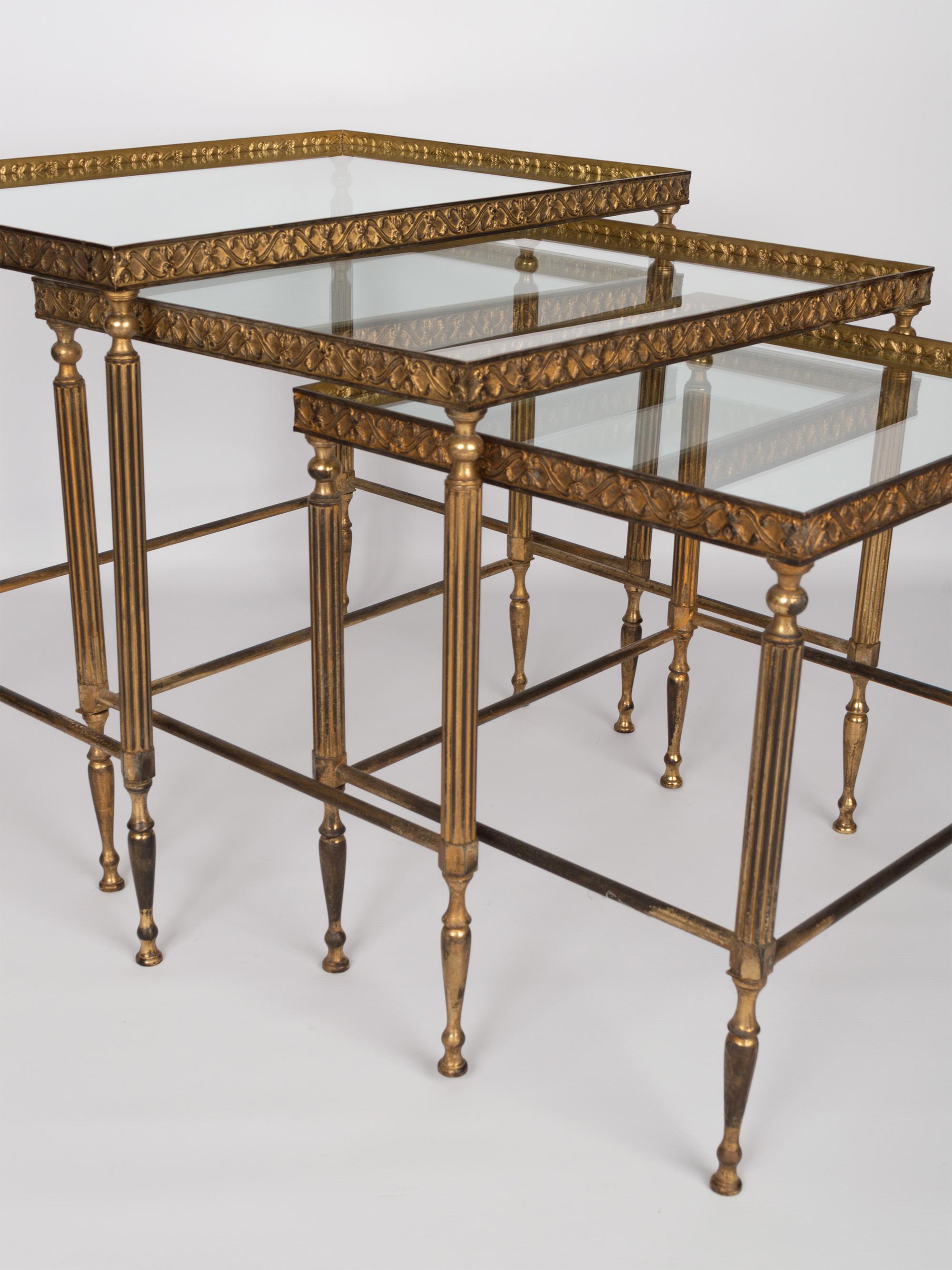 Midcentury bronze brass and glass nesting tables by Maison Baguès. France, circa 1940.
In very good vintage condition commensurate of age. Minor splinter to corner of glass (not directly visible when sitting in frame).
Dimensions:
W 54 x D 37 x H