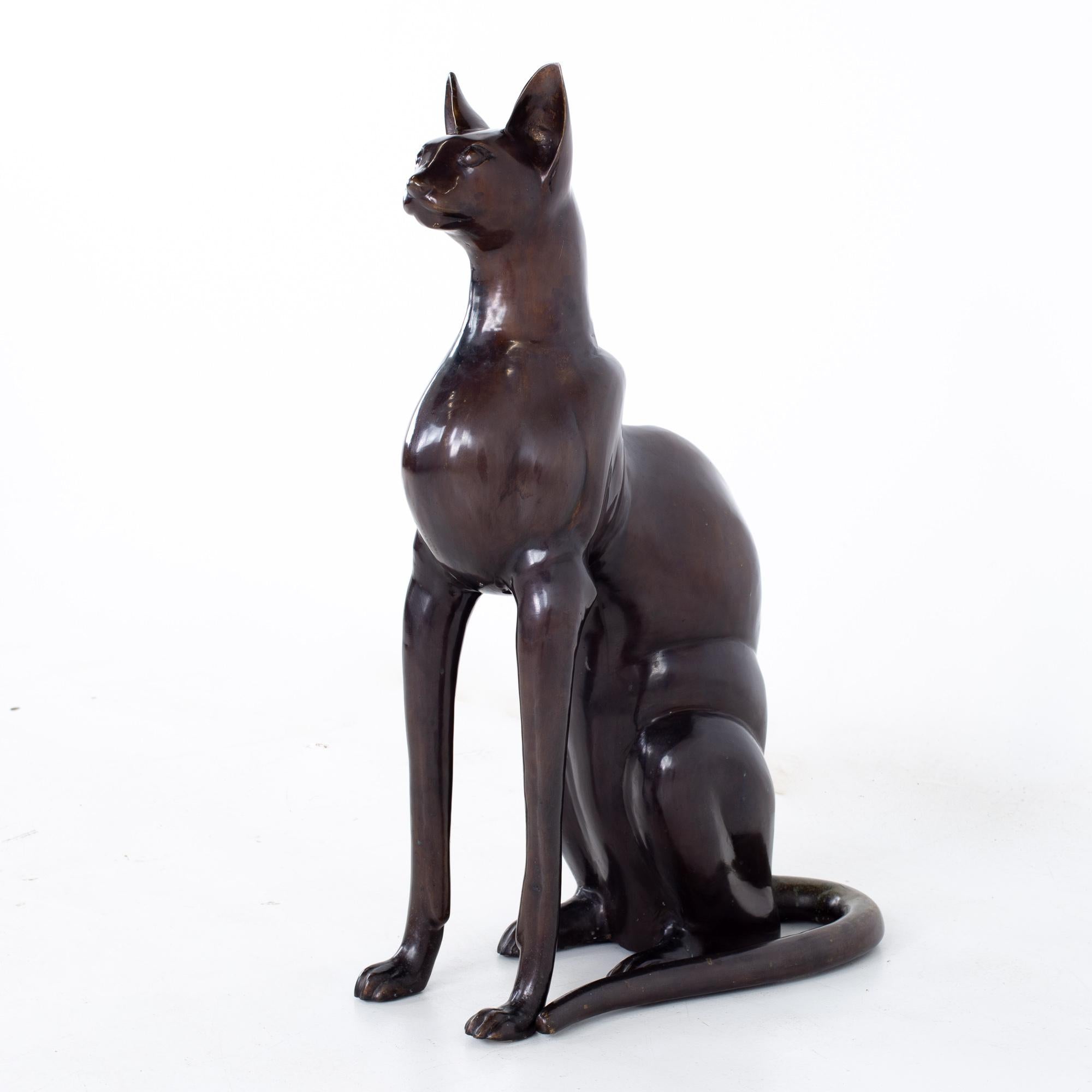 Mid century bronze cat sculpture
Sculpture measures: 8 wide x 20 deep x 32 inches high

All pieces of furniture can be had in what we call restored vintage condition. That means the piece is restored upon purchase so it’s free of watermarks,