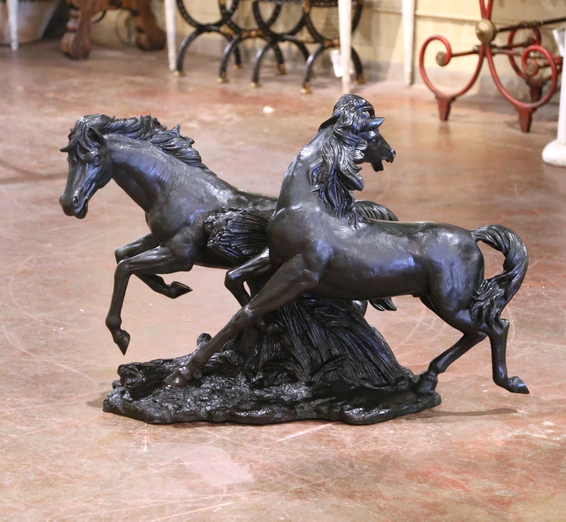 Celebrate the spirit of motion and vitality with this dynamic bronze horse sculpture by American artist David Alan Jones. Cast in the mid-20th century using the lost-wax technique, the work depicts two galloping horses in full stride, their manes
