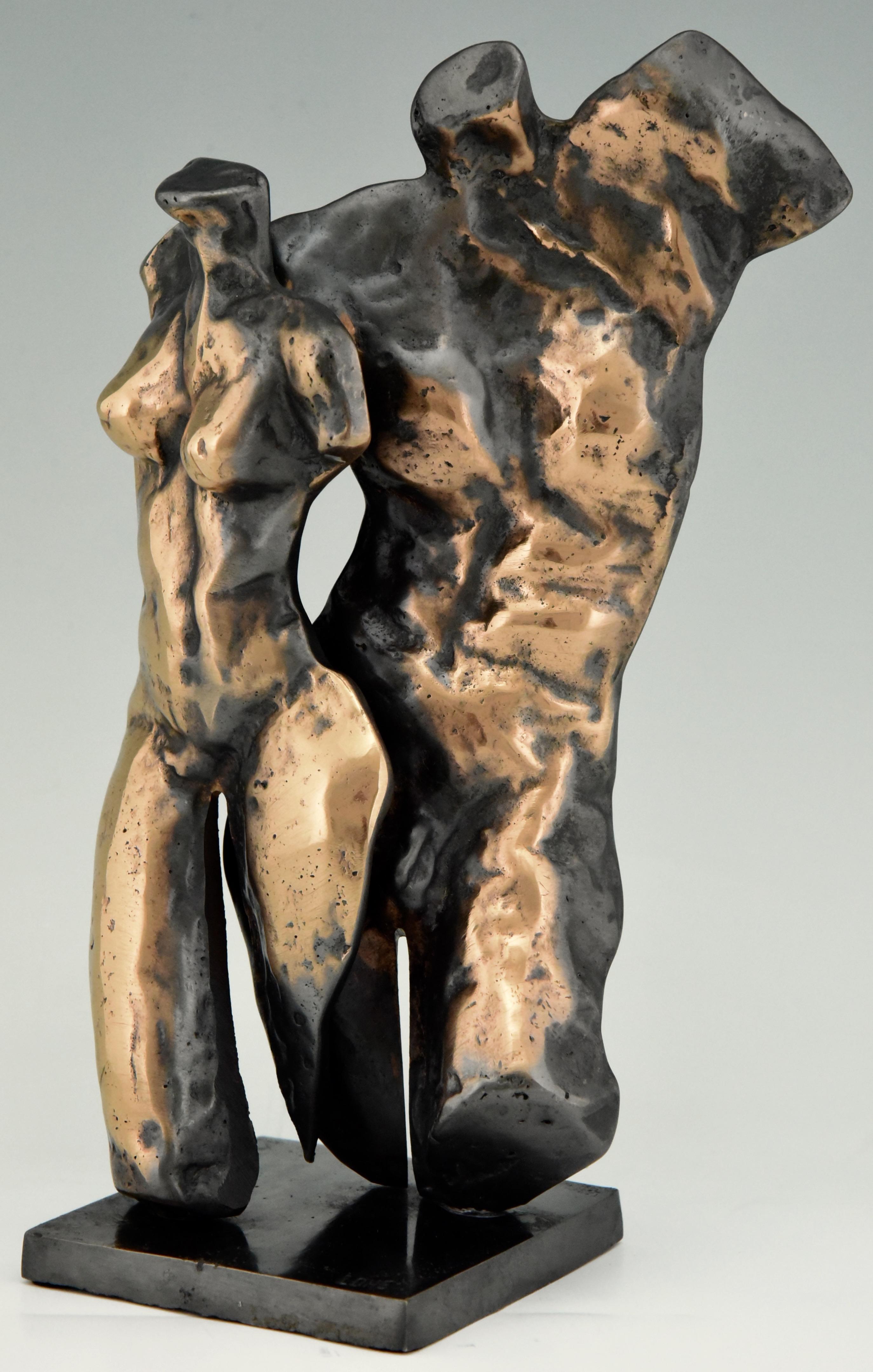 Midcentury bronze sculpture male and female torso by the French artist Yves Lohé, circa 1970.
 
   