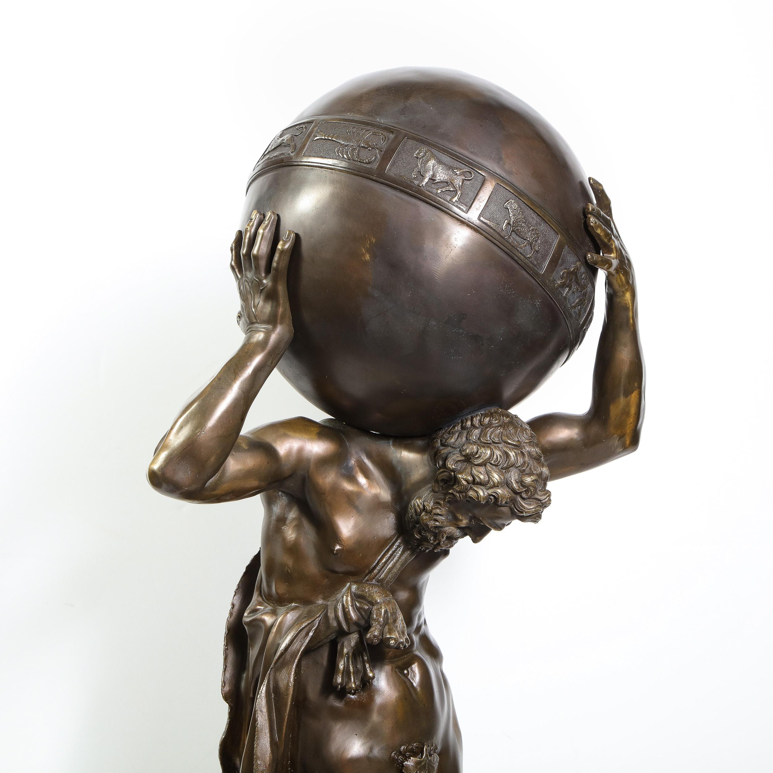 Midcentury Bronze Sculpture of Atlas Holding Globe Banded with Zodiac Symbols In Good Condition In New York, NY
