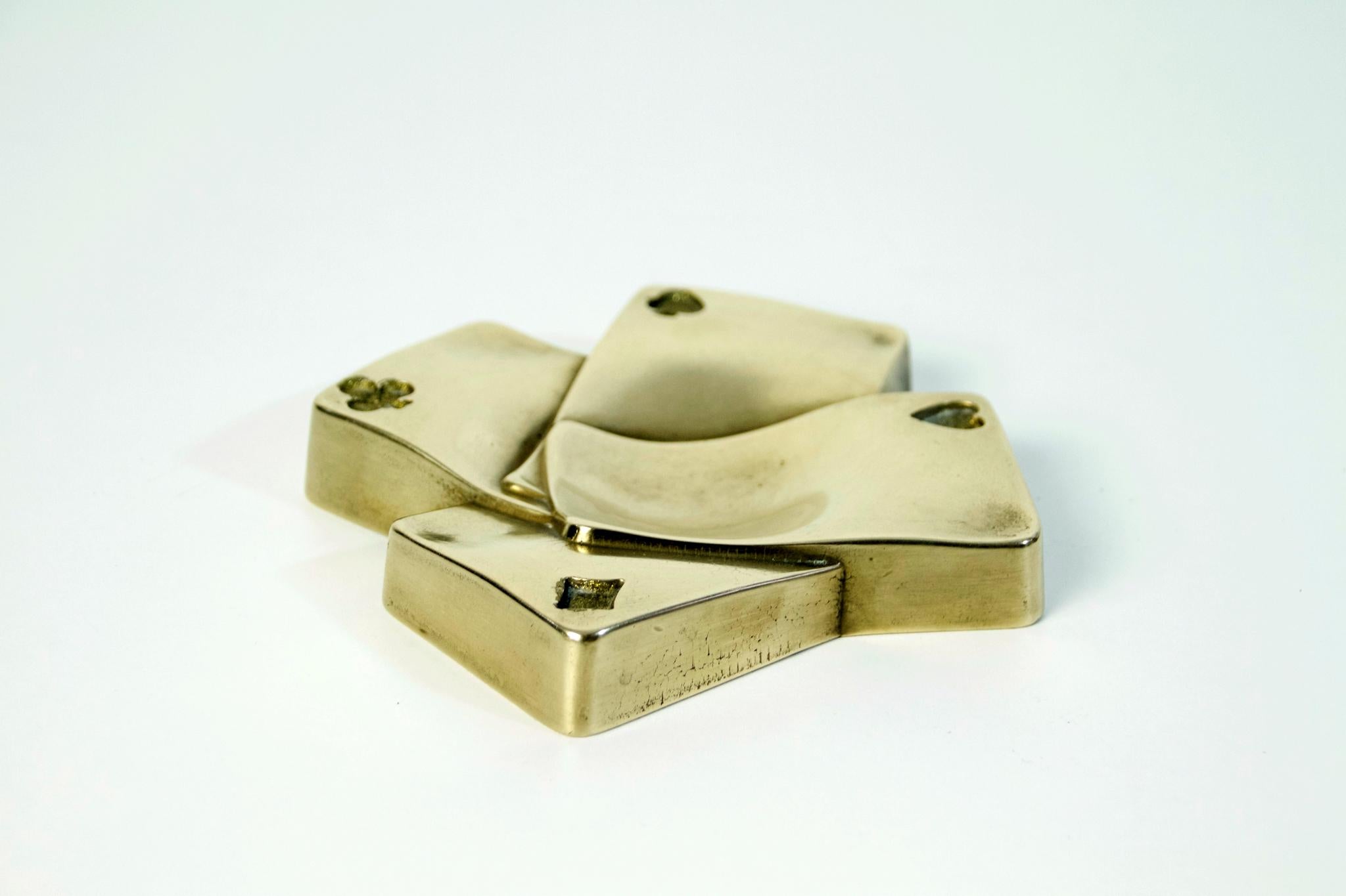 Sand cast bronze tray that can be used for keys, nick-nacks or as ashtray, or simply because it’s fun and beautiful.
