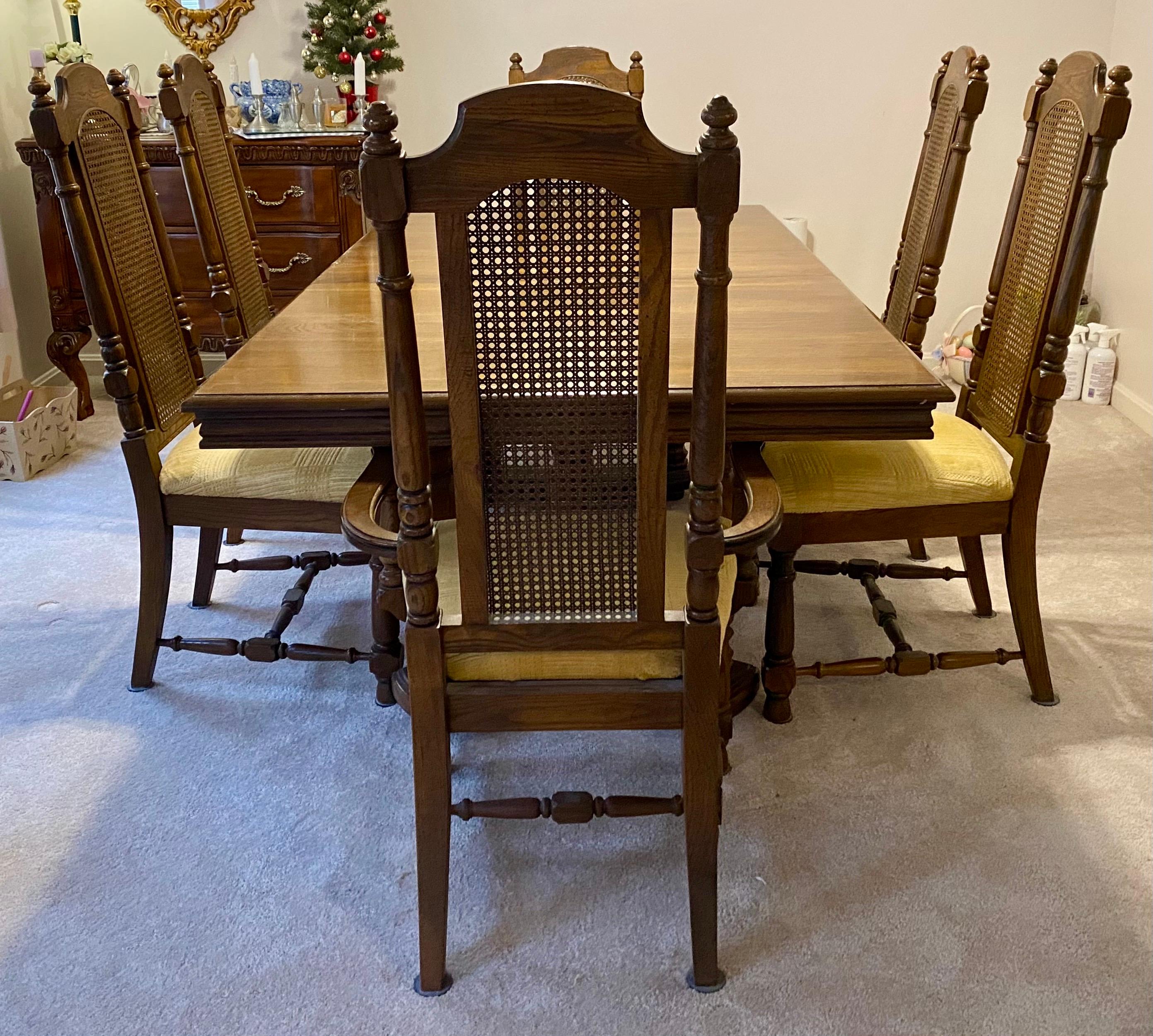 This is a great looking mid century Broyhill Conover Furniture Co. dining room set including a table  two three leg supports and one leaf, 2 arm and 4 side chairs. The entire set is in good condition but there is some finish wear along the edges