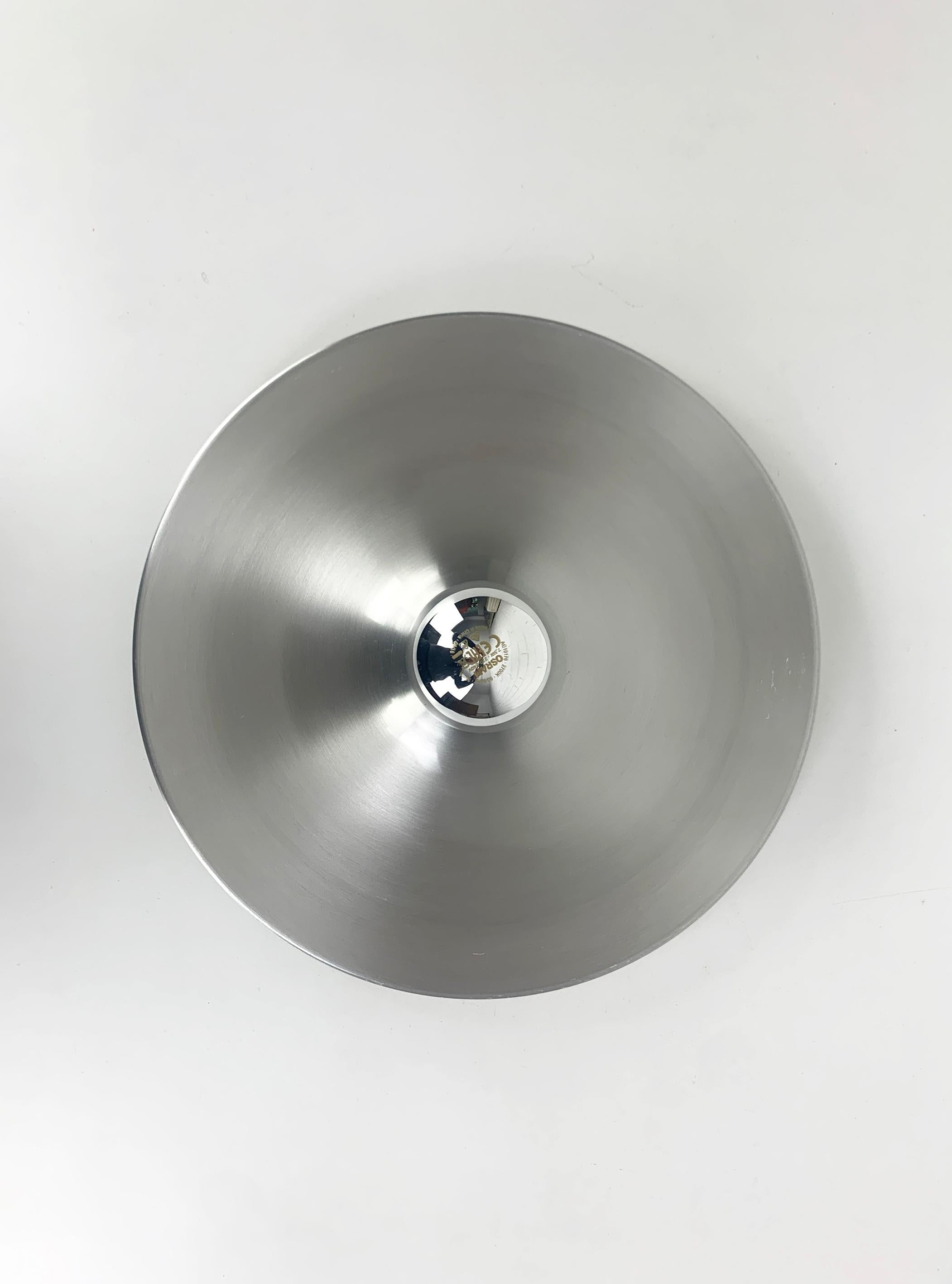 Flush light from an apartment of Les Arcs in the French Alps. 

These sconces were commissioned / selected by Charlotte Perriand for the interior design of the flats of the 'Les Arcs' and Méribel Ski Resorts in the French Alps.

This is the smaller
