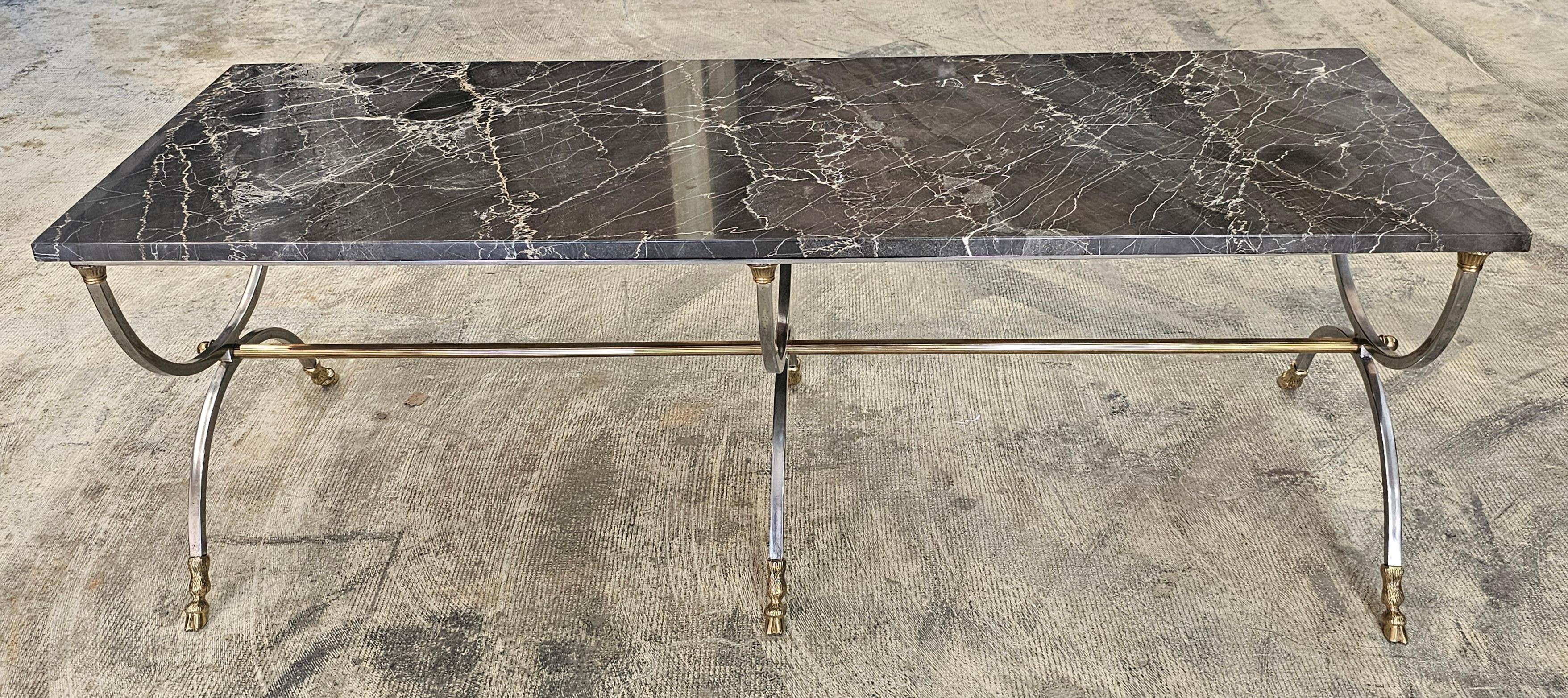 Mid-Century Brushed Metal and Brass Goat Feet with Nebel Marble Top Coffee Cocktail Table
Measures 56.25