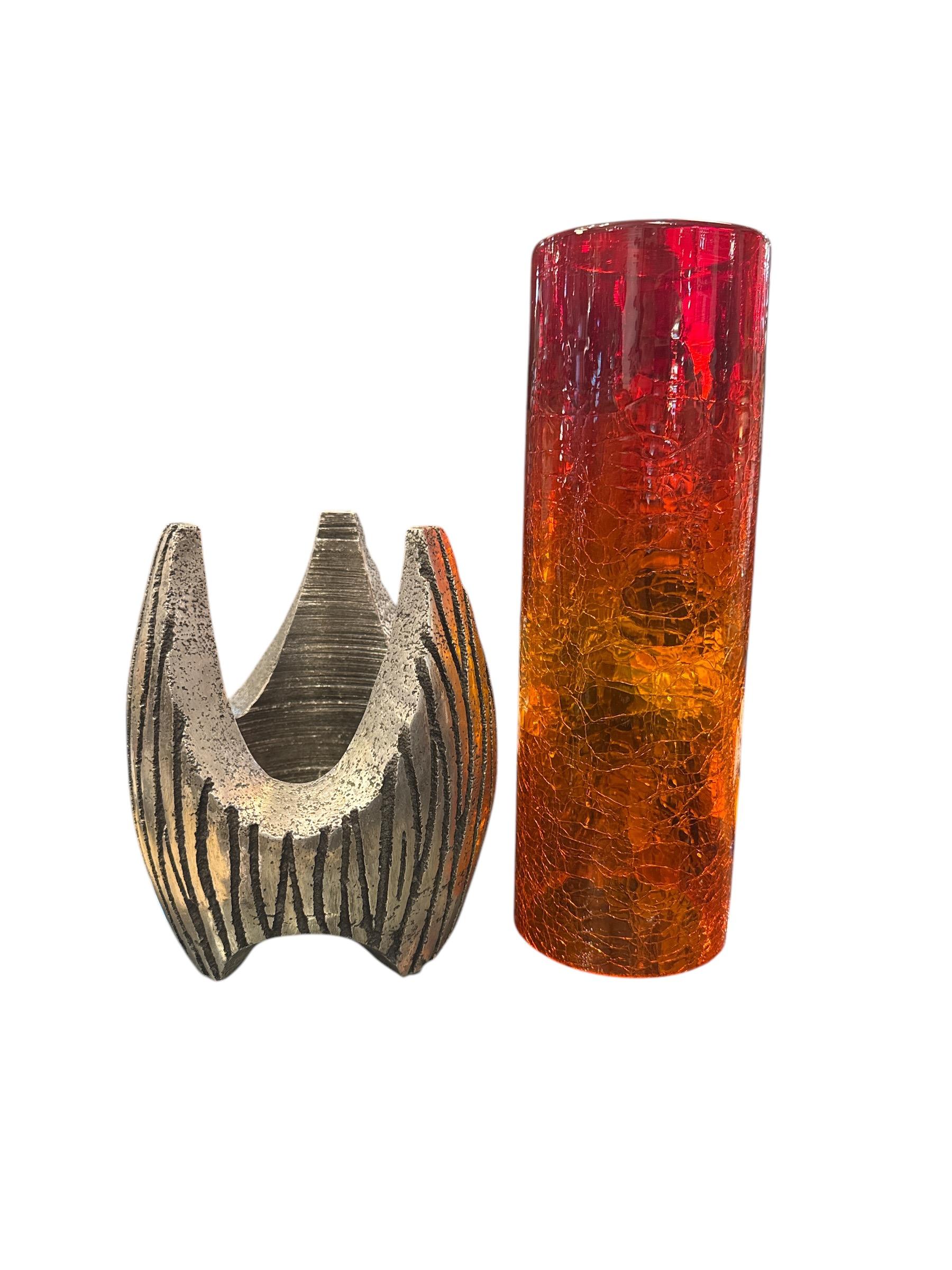 Add an artistic edge to your home decor with the Mid-Century Brutalist Aluminum and Glass Candle Holder—a striking fusion of industrial design and timeless elegance. Inspired by the bold, raw aesthetic of Brutalism, this candle holder blends