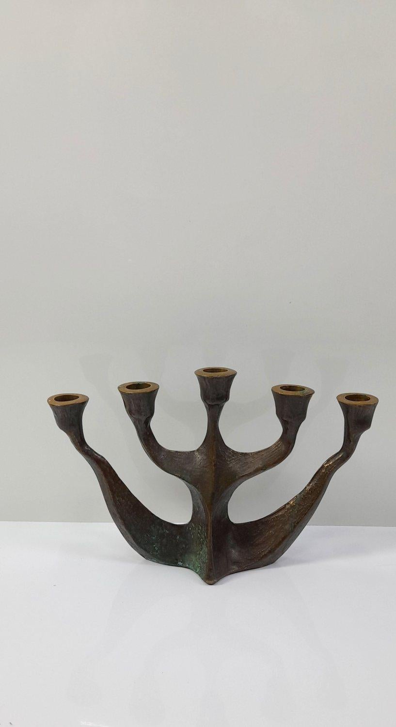 Solid Mid-century five-arm brutalist candleholder designd by Michael Harjes in the 1960's. Perfect condition.