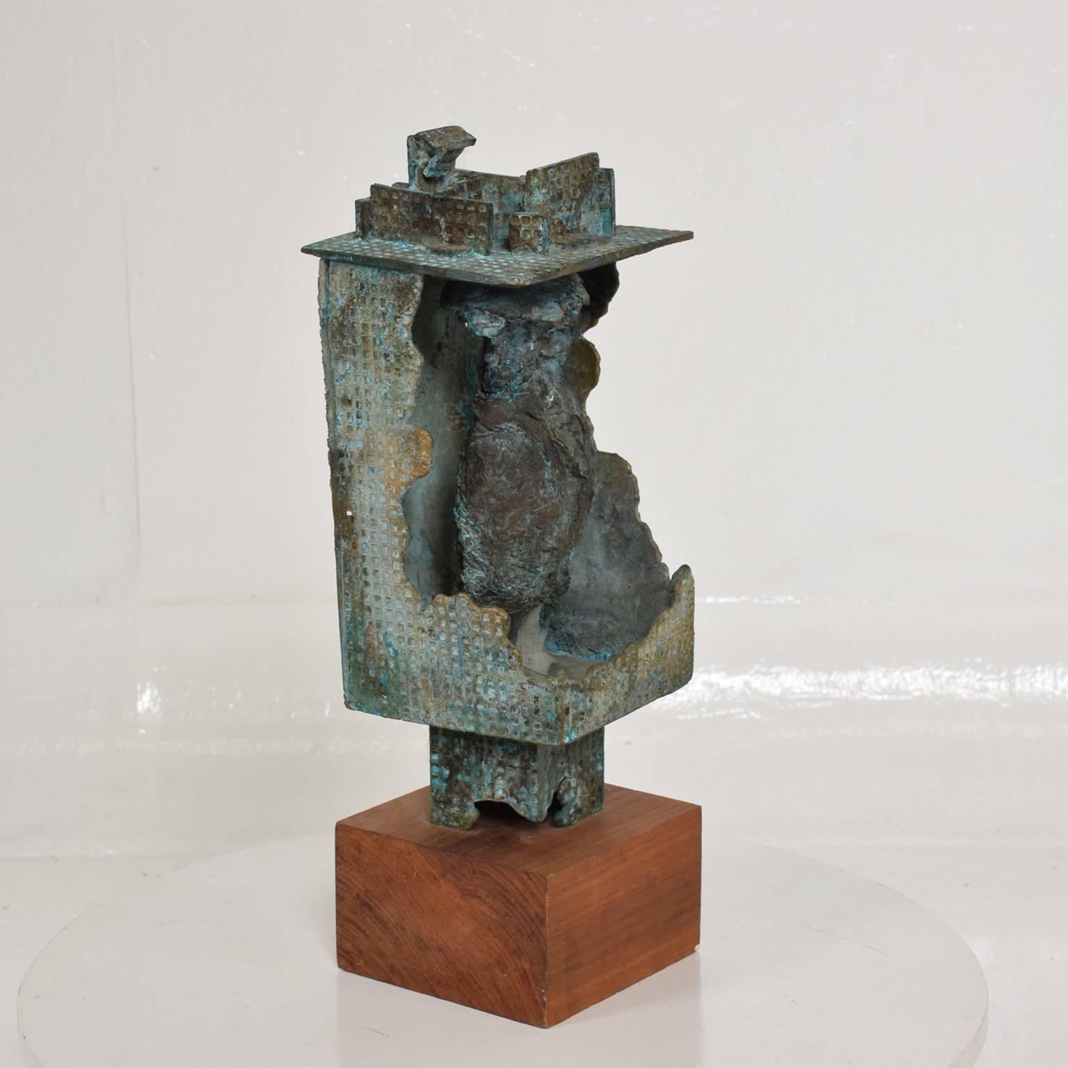 For your consideration a stunning Brutalist bronze sculpture in walnut base by Myrna Nobile.
California, circa 1960s.
 