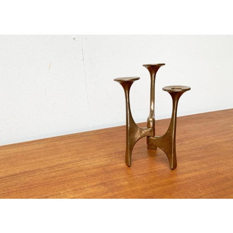 Mid-Century Brutalist Candleholder from Harjes, Germany, 1960s, in Very Good conditions. Designed 1960 to 1969 This piece has an attribution mark.

Additional information:
Material: Metal
Color: Gold
Styles: Brutalist, Mid-Century Modern
Country of
