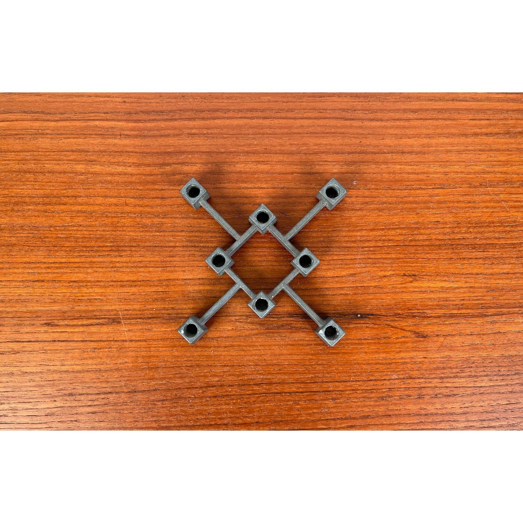 Mid-Century Danish Brutalist Cast Iron Candleholder by Jens H. Quistgaard for Paro, 1960s, in Very Good conditions. Designed 1960 to 1969 This piece has an attribution mark.

Additional information:
Materials: Metal
Color: Gray
Styles: Brutalist,