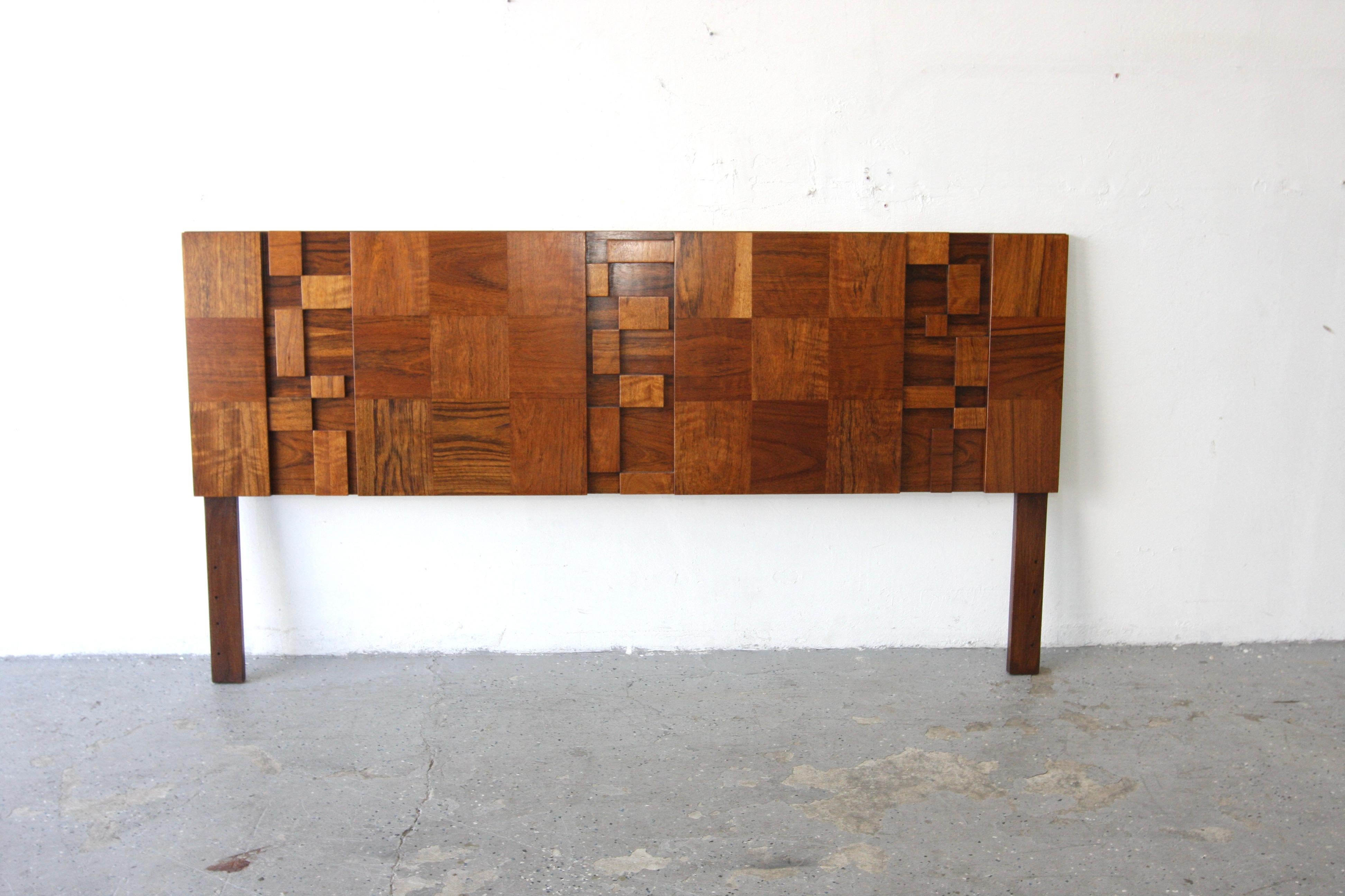 Paul Evans style lane Brutalist Mid Century Walnut King Headboard (two available)

Paul Evans style lane Brutalist mid century walnut queen headboard.  Very nice Lane brutalist headboard headboard. Headboard has been  refinished and brought back to