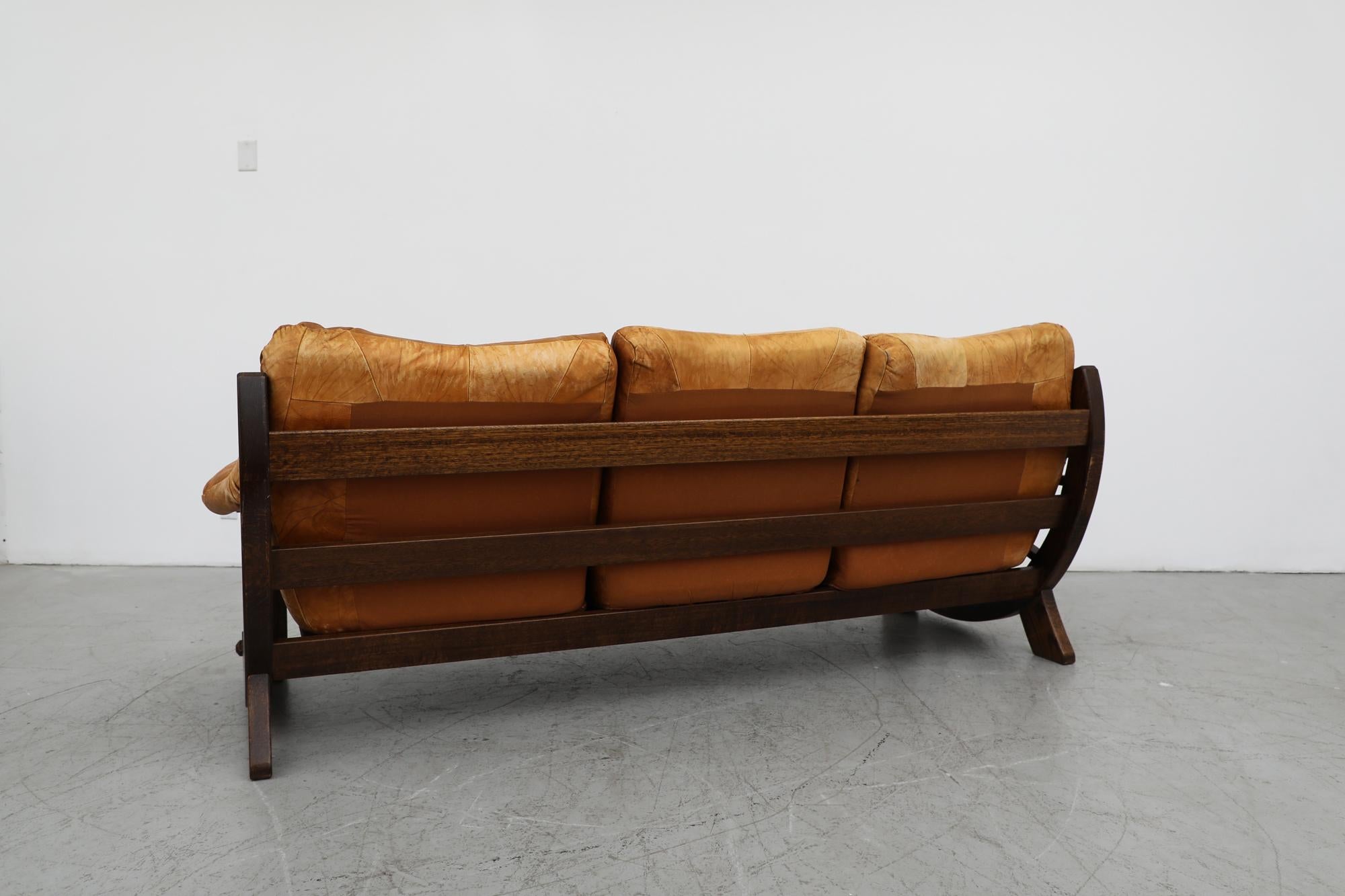 Dutch Mid-Century Brutalist Brown Leather Patchwork Sofa with Western Style Wood Frame For Sale