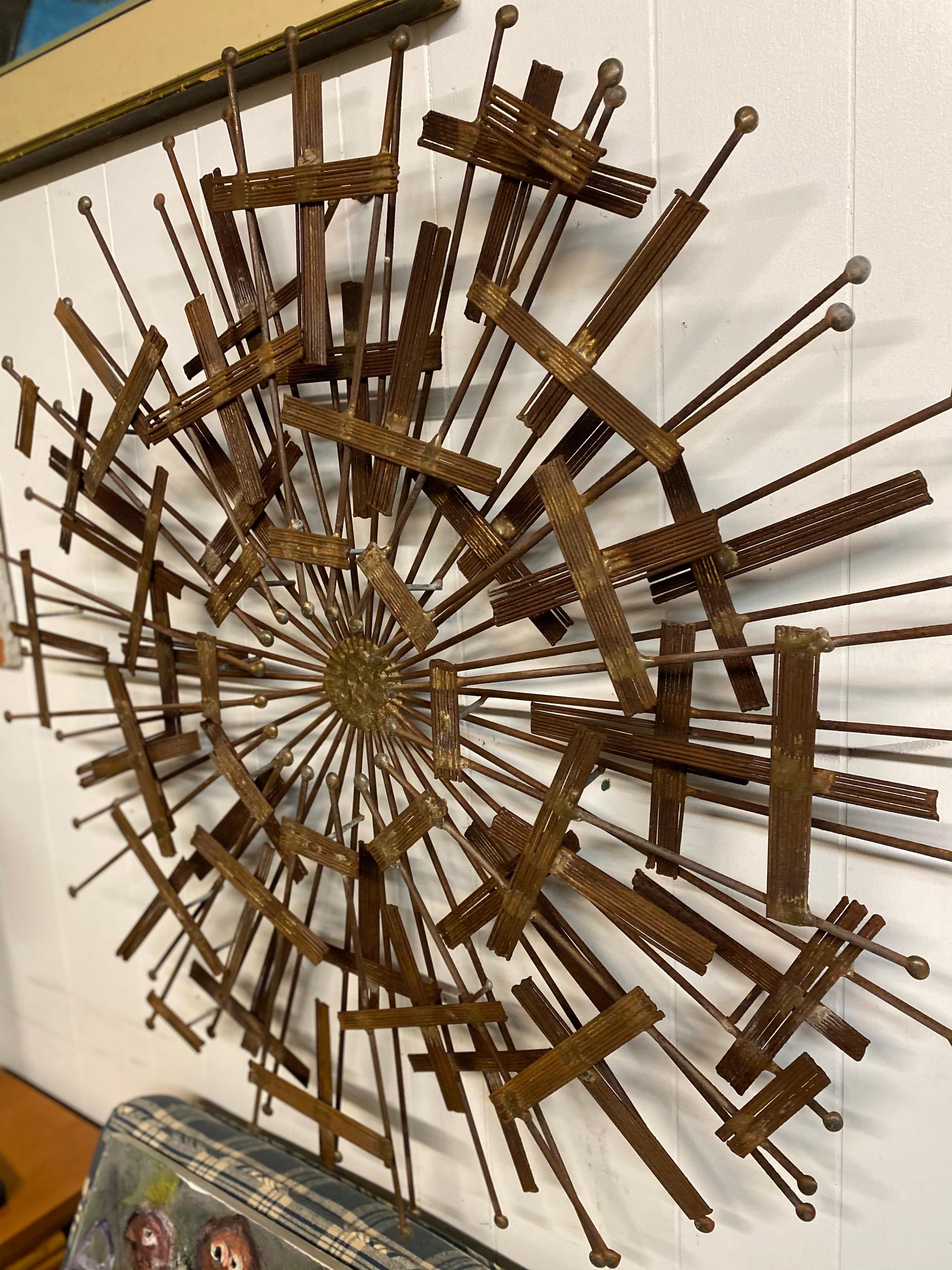 Mid-century modern brutalist metal wall sculpture, circa 1970s. This wall art is in great vintage condition.
