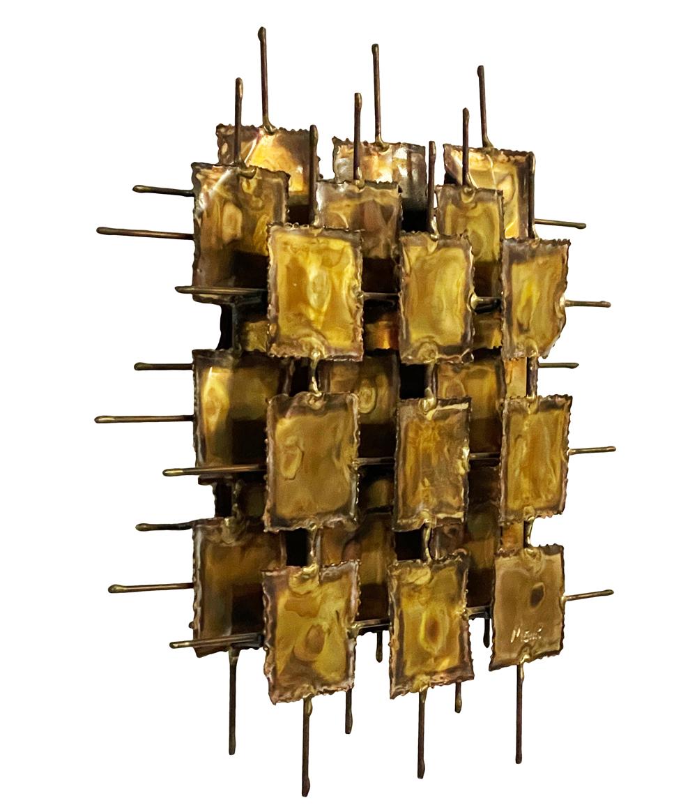 A sleek modern brutalist wall sculpture circa 1960's. Well constructed and designed, signed Monk.